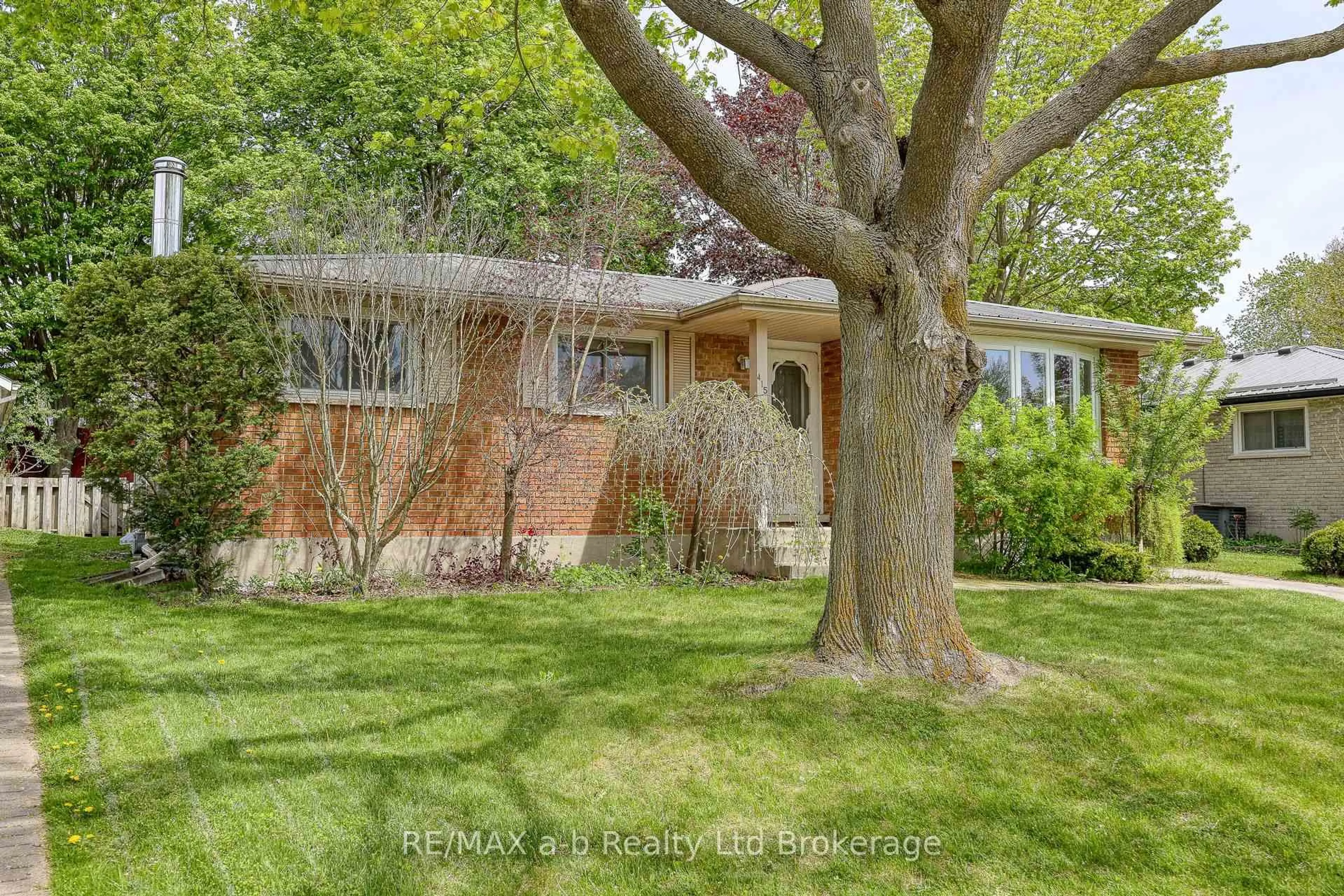 Home with brick exterior material, street for 415 Lampman Pl, Woodstock Ontario N4S 3S9