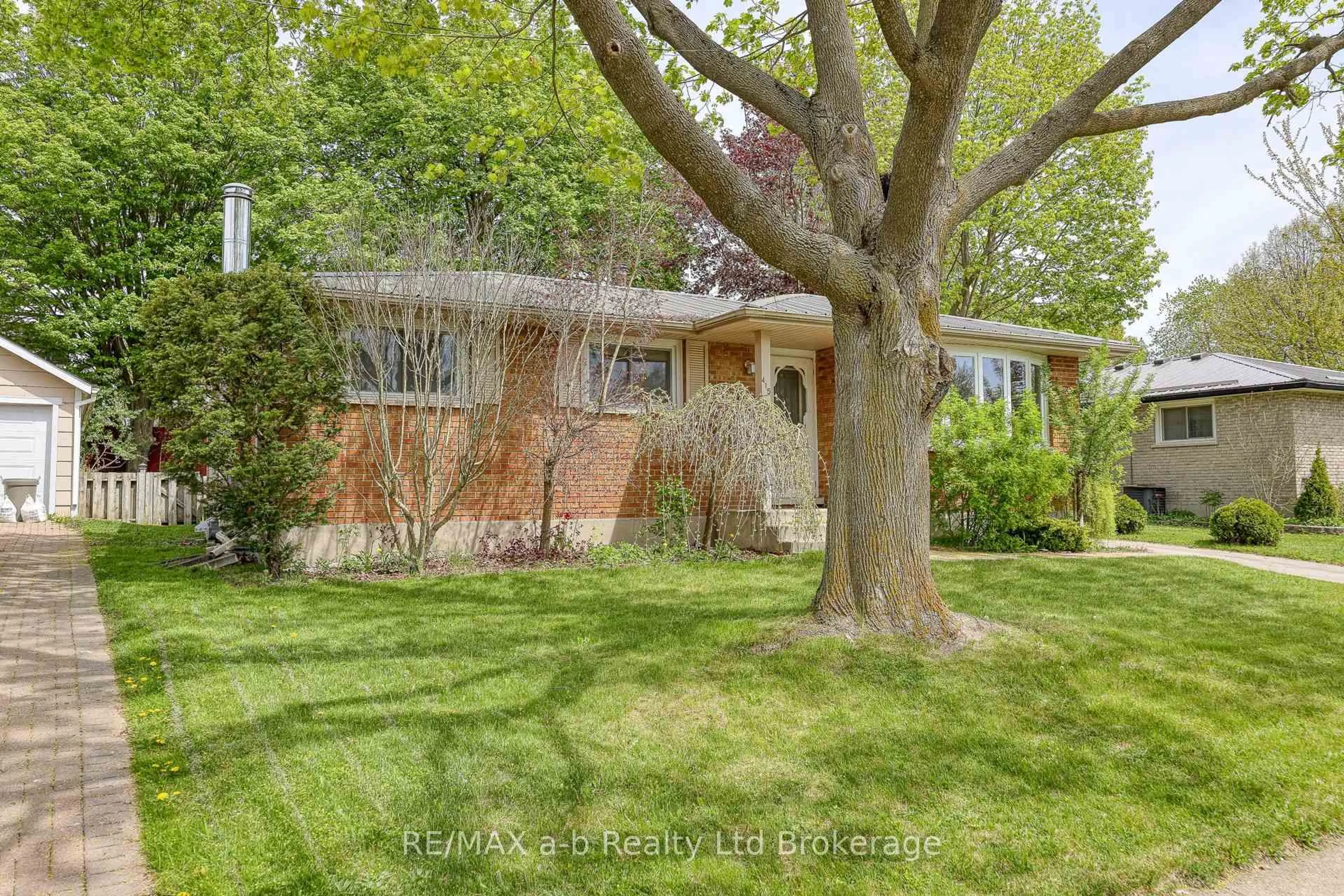 Home with brick exterior material, street for 415 Lampman Pl, Woodstock Ontario N4S 3S9