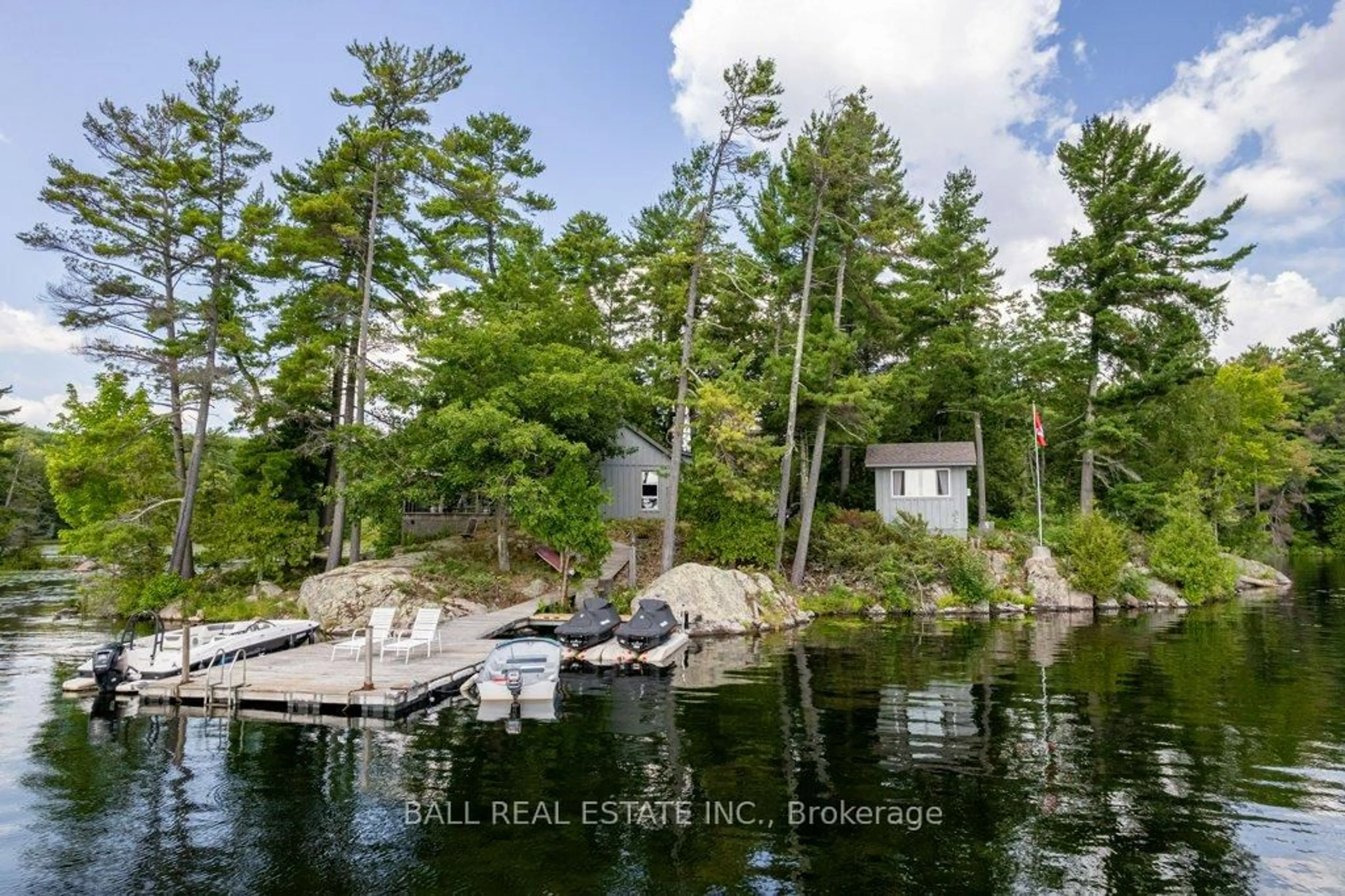 A pic from outside/outdoor area/front of a property/back of a property/a pic from drone, water/lake/river/ocean view for 132 Island 23B N/A, Selwyn Ontario K0L 2H0