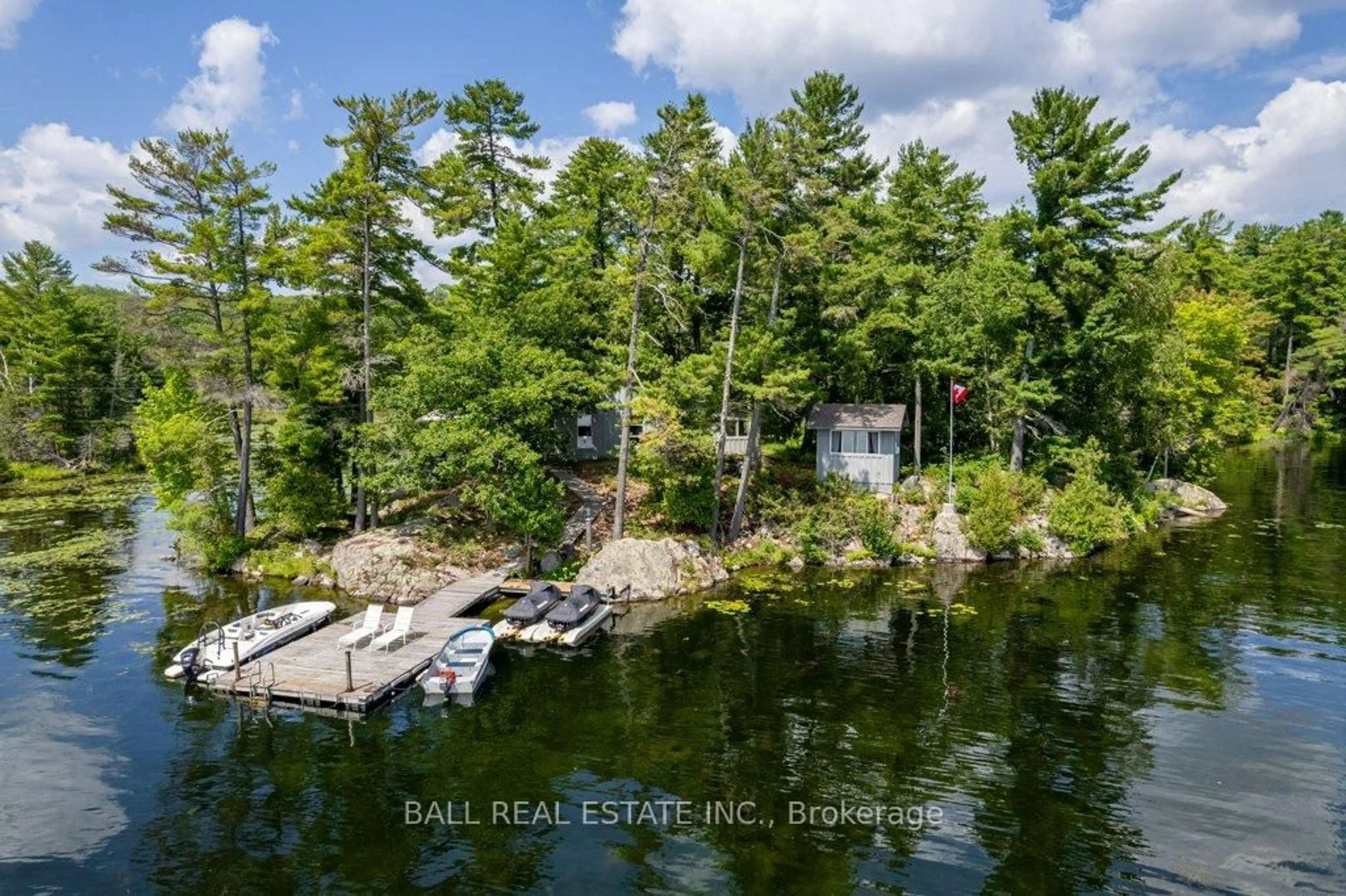 A pic from outside/outdoor area/front of a property/back of a property/a pic from drone, water/lake/river/ocean view for 132 Island 23B N/A, Selwyn Ontario K0L 2H0
