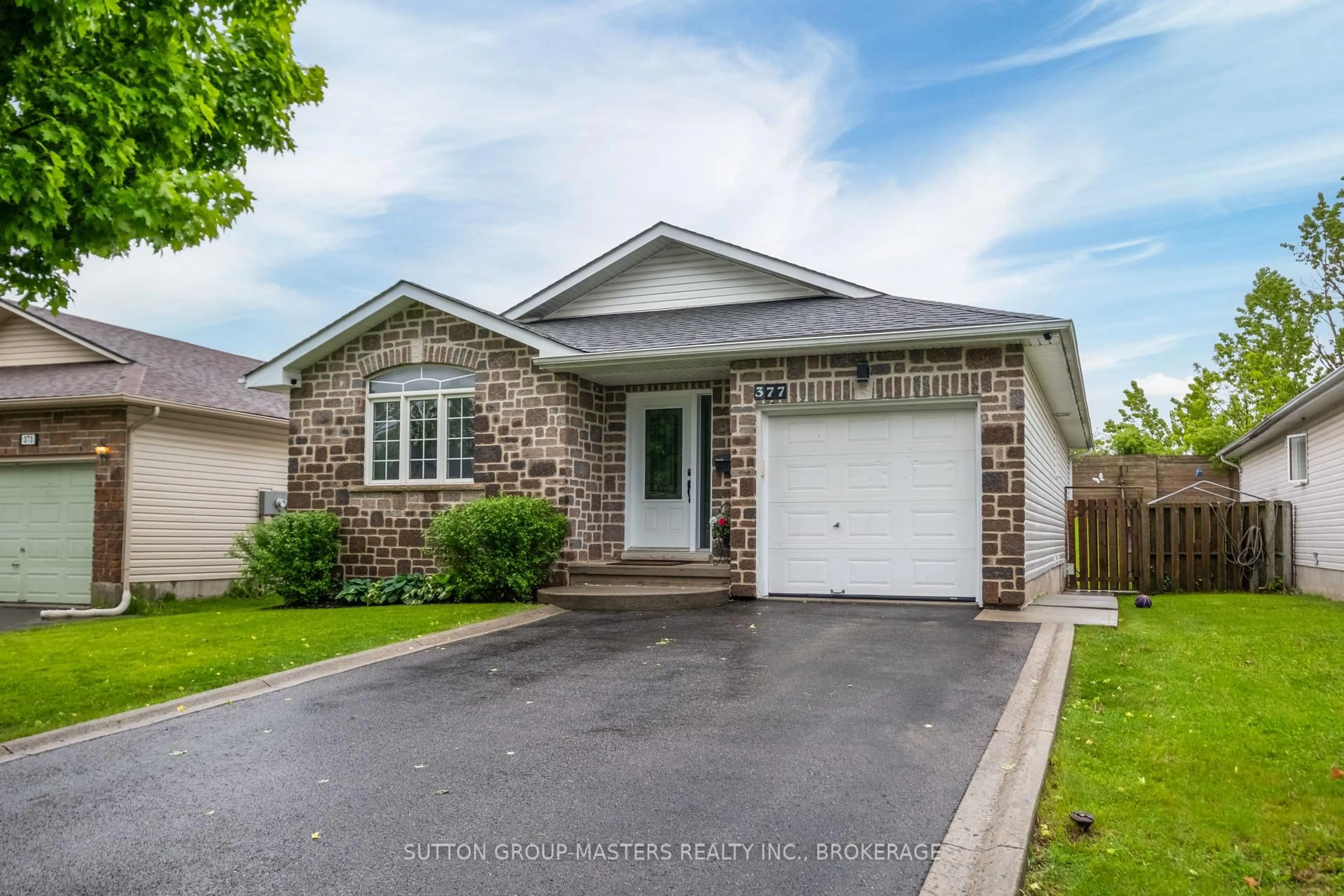 Home with vinyl exterior material, street for 377 BOXWOOD St, Kingston Ontario K7M 9C3