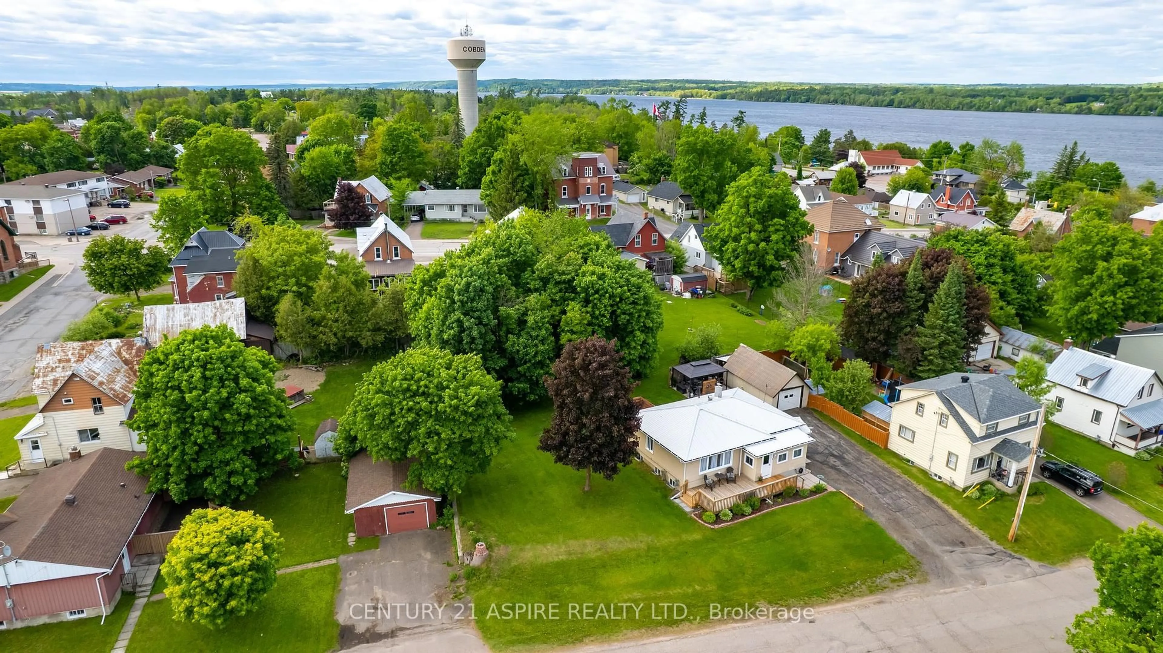 A pic from outside/outdoor area/front of a property/back of a property/a pic from drone, water/lake/river/ocean view for 16 Dixon St, Cobden Ontario K0J 1K0