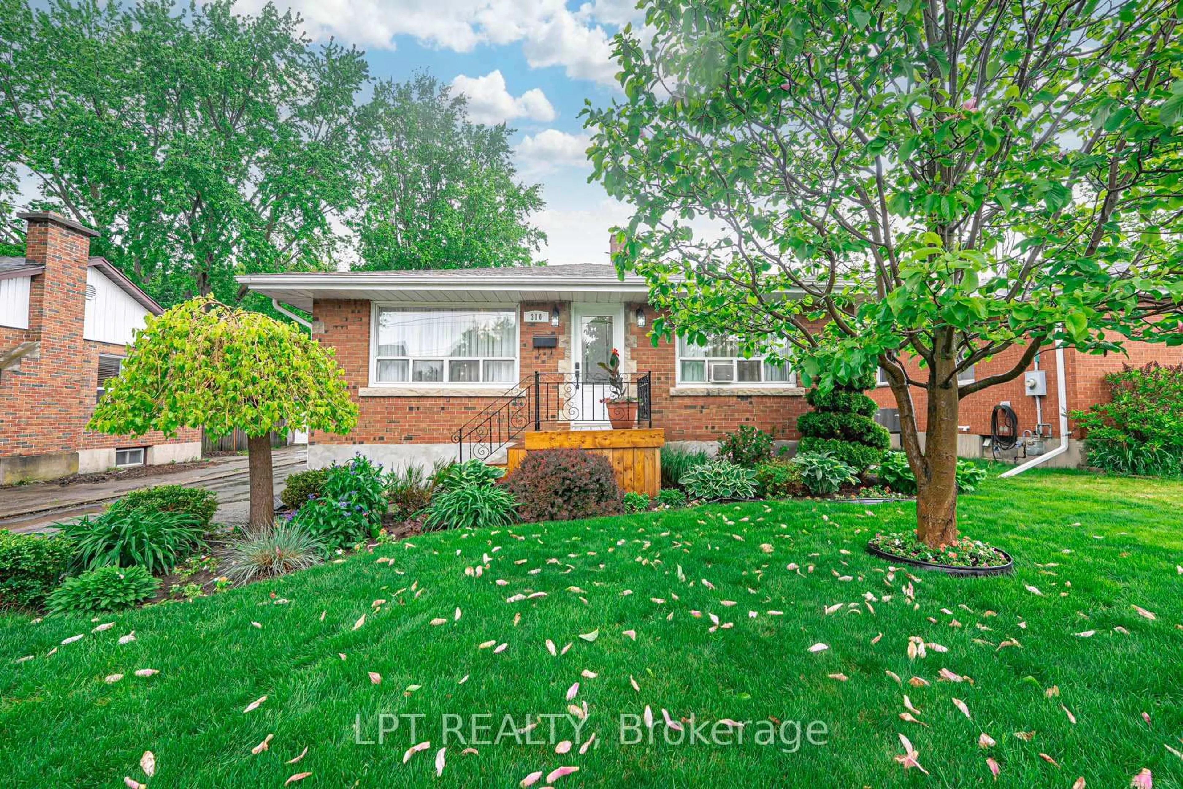 Home with brick exterior material, street for 310 Grey St, Brantford Ontario N3S 4X1