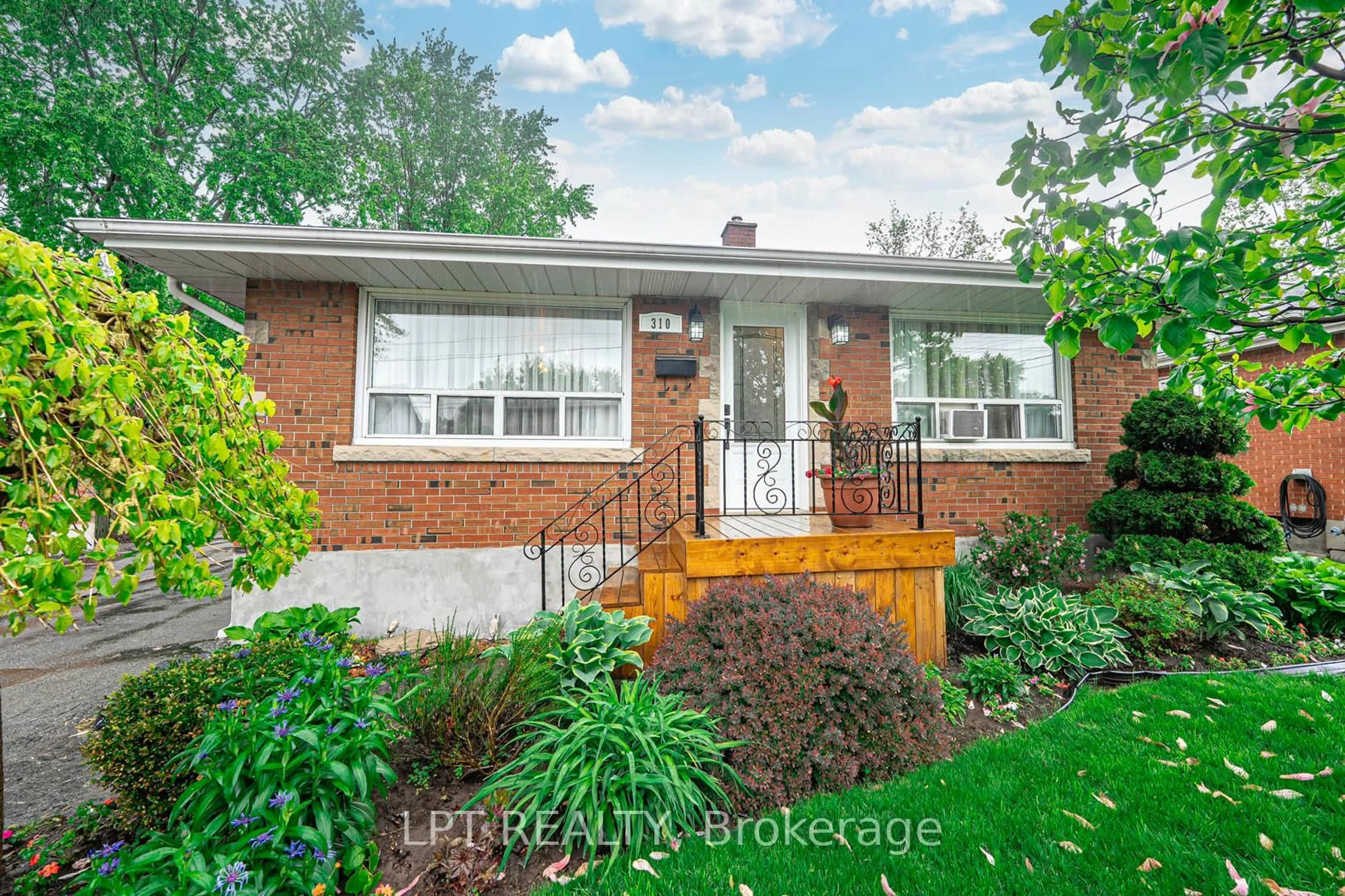 Home with brick exterior material, street for 310 Grey St, Brantford Ontario N3S 4X1