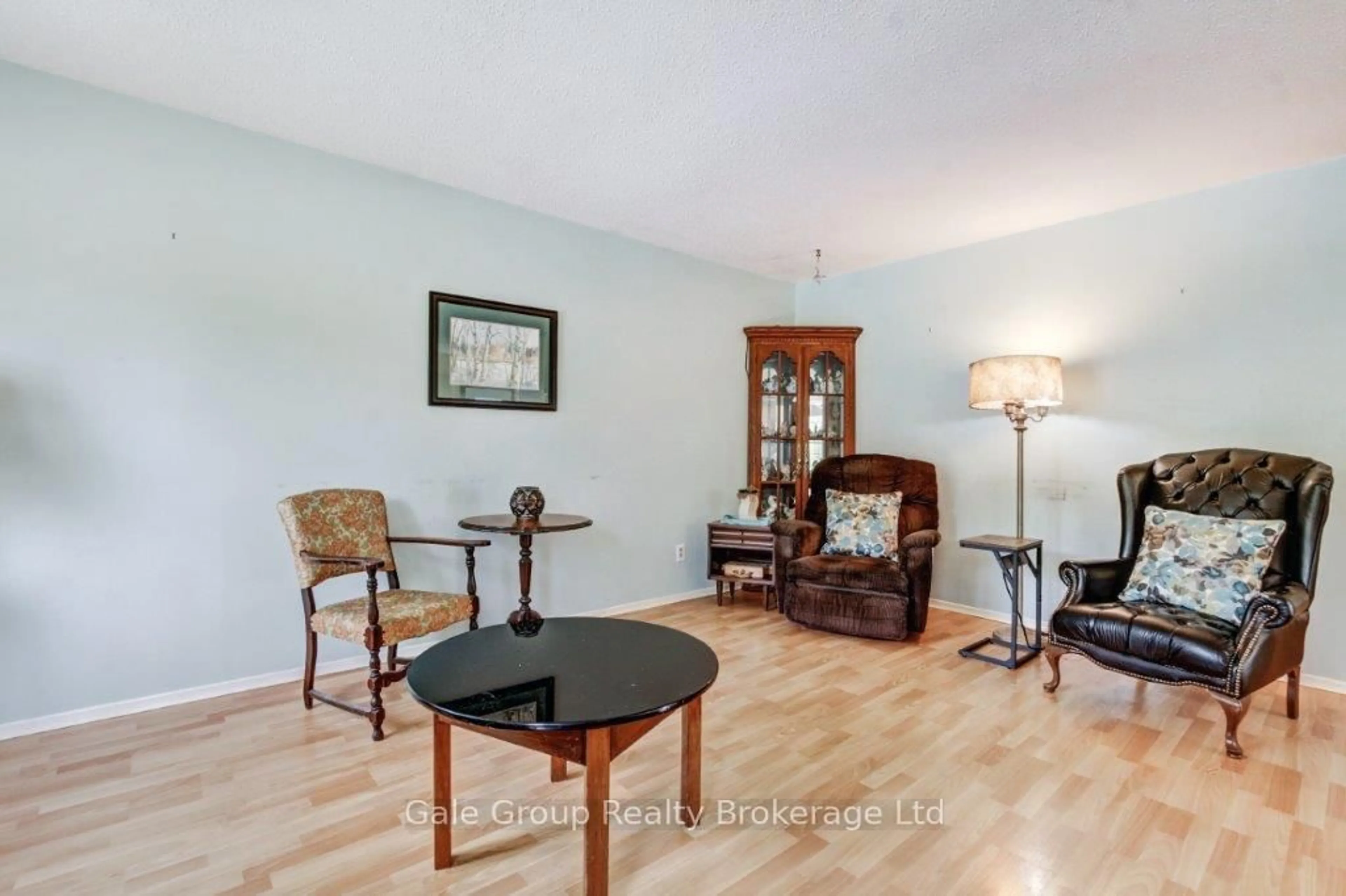 Living room with furniture, wood/laminate floor for 796 Rathbourne Ave, Woodstock Ontario N4S 4L7