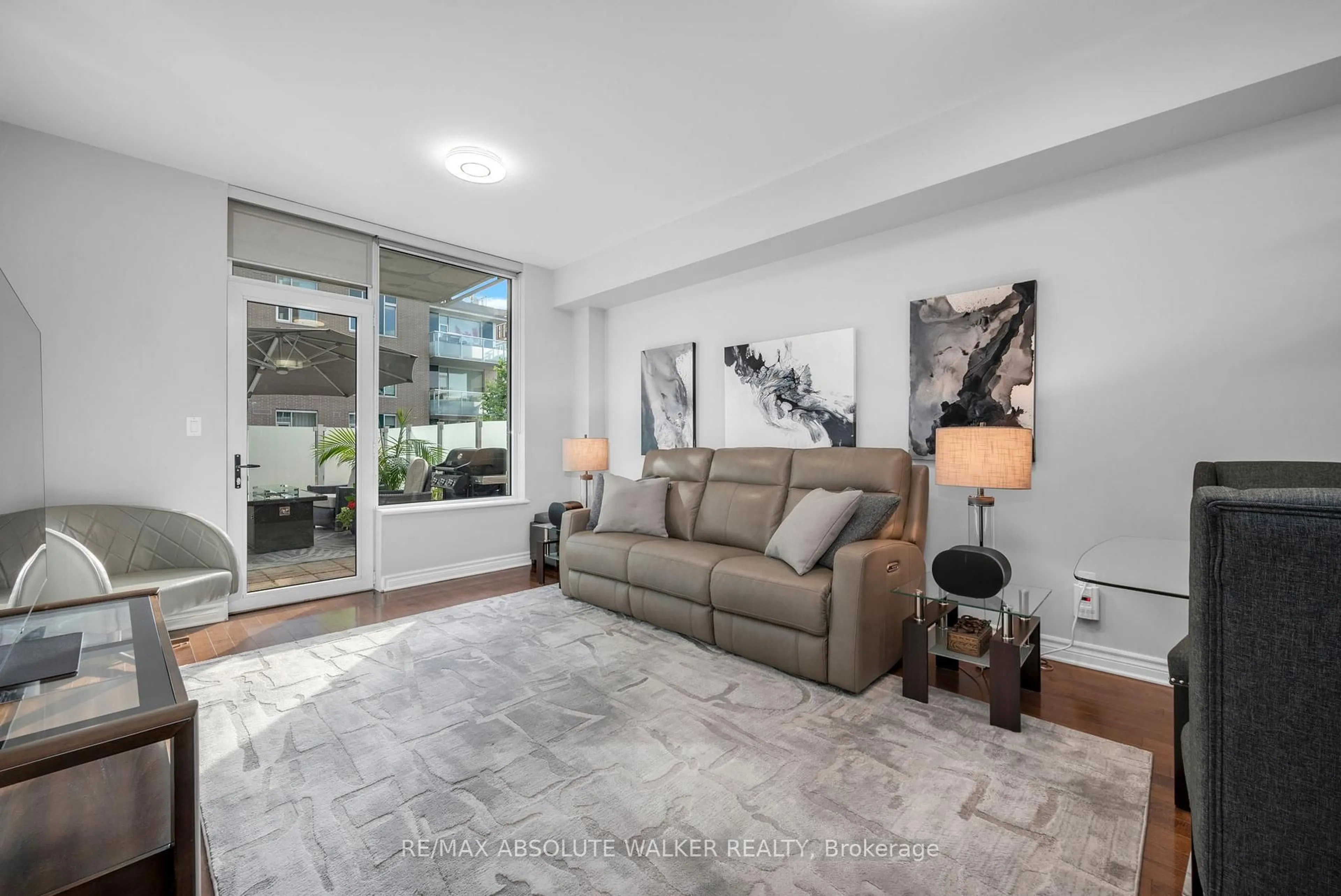 Living room with furniture, unknown for 575 Byron Ave #214, Ottawa Ontario K2A 1R7