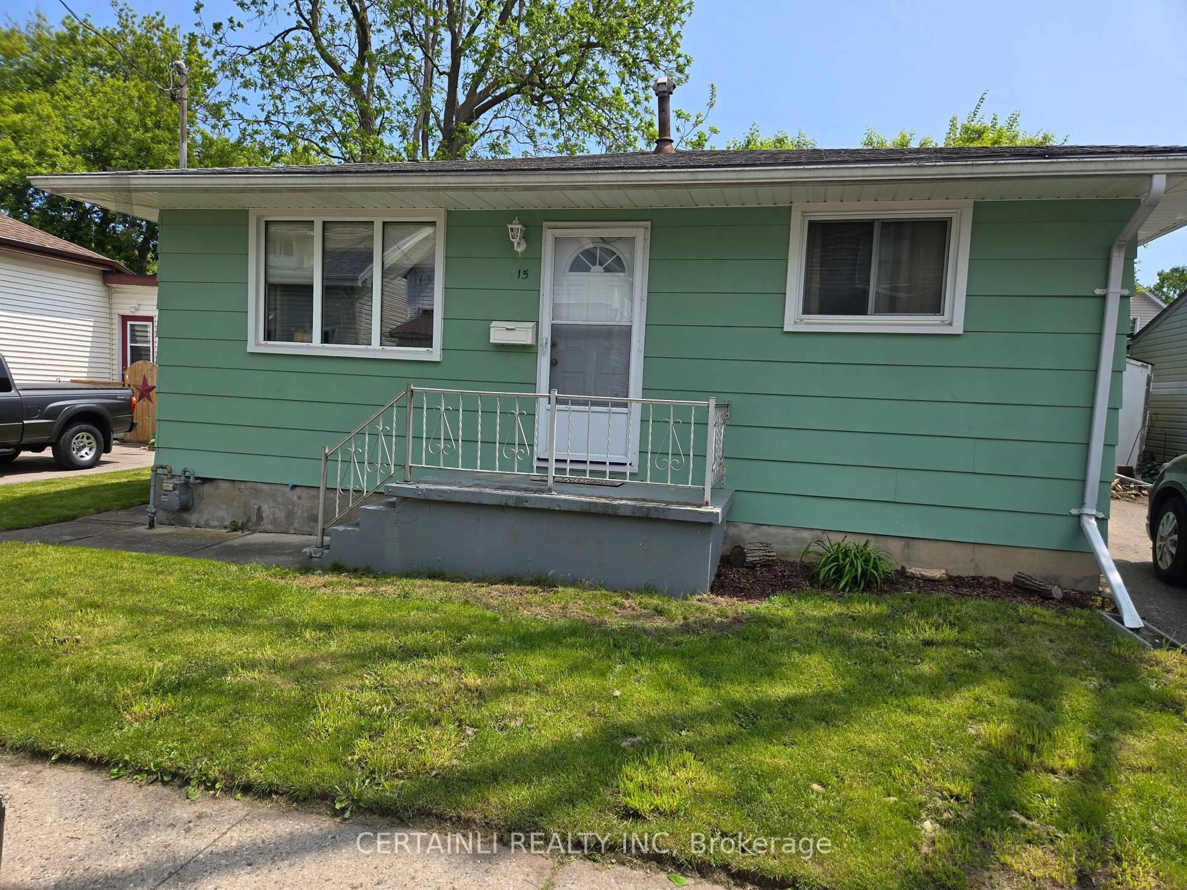 Home with vinyl exterior material, street for 15 Penwarden St, St. Thomas Ontario N5P 2R6