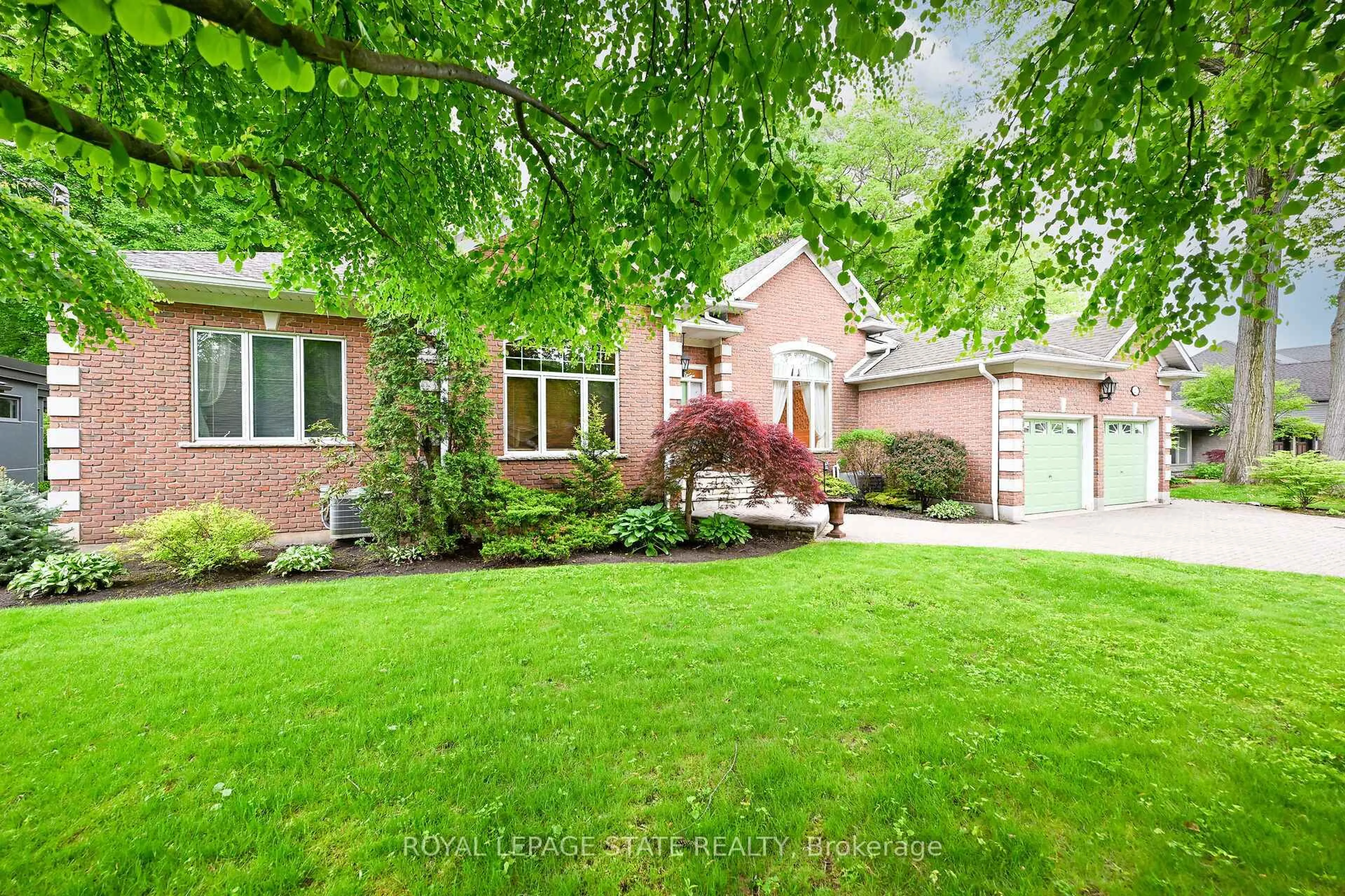 Home with brick exterior material, street for 253 Robina Rd, Hamilton Ontario L9G 2L6
