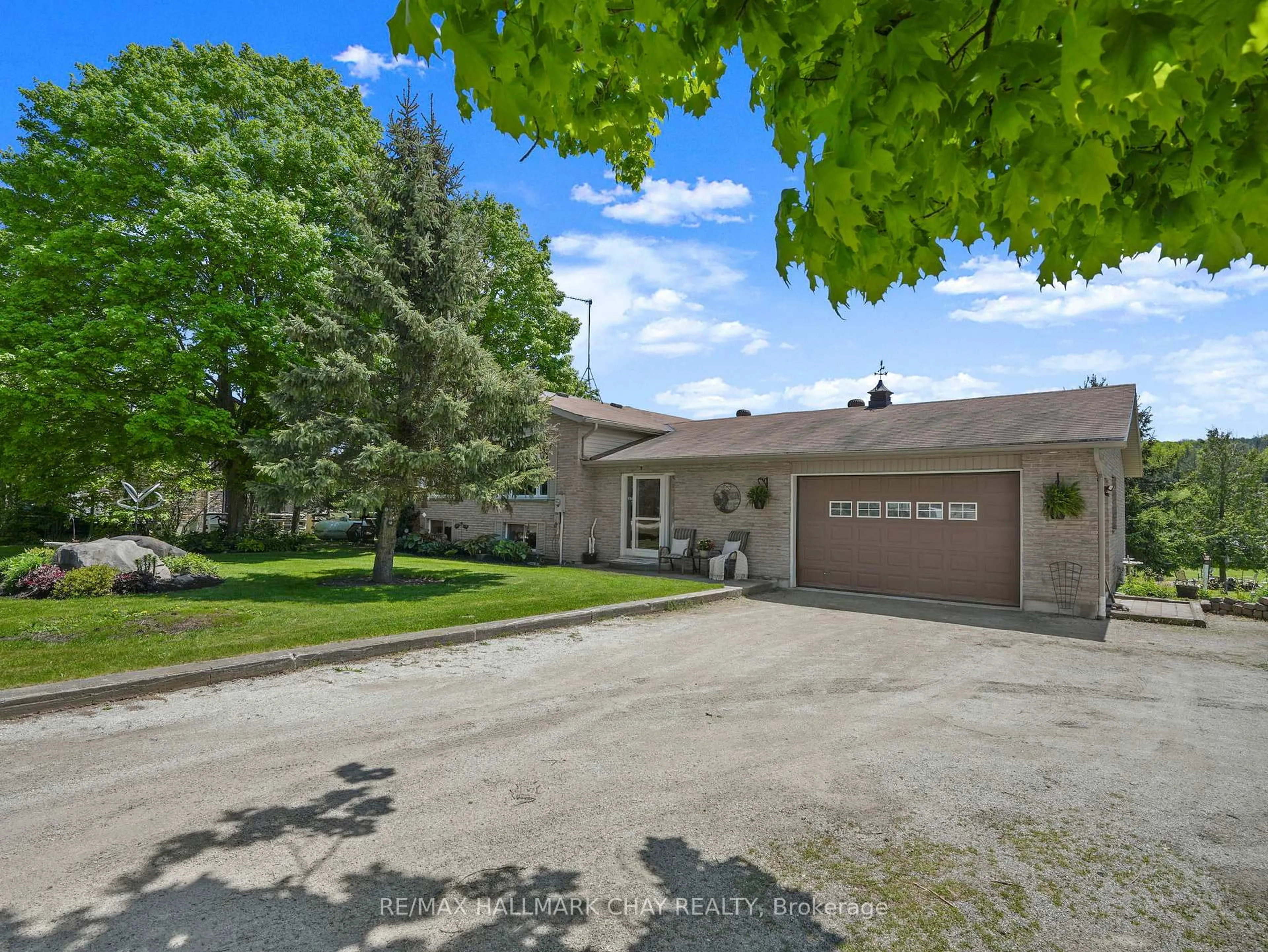 A pic from outside/outdoor area/front of a property/back of a property/a pic from drone, street for 667280 20th Sdrd, Mulmur Ontario L9V 0V6