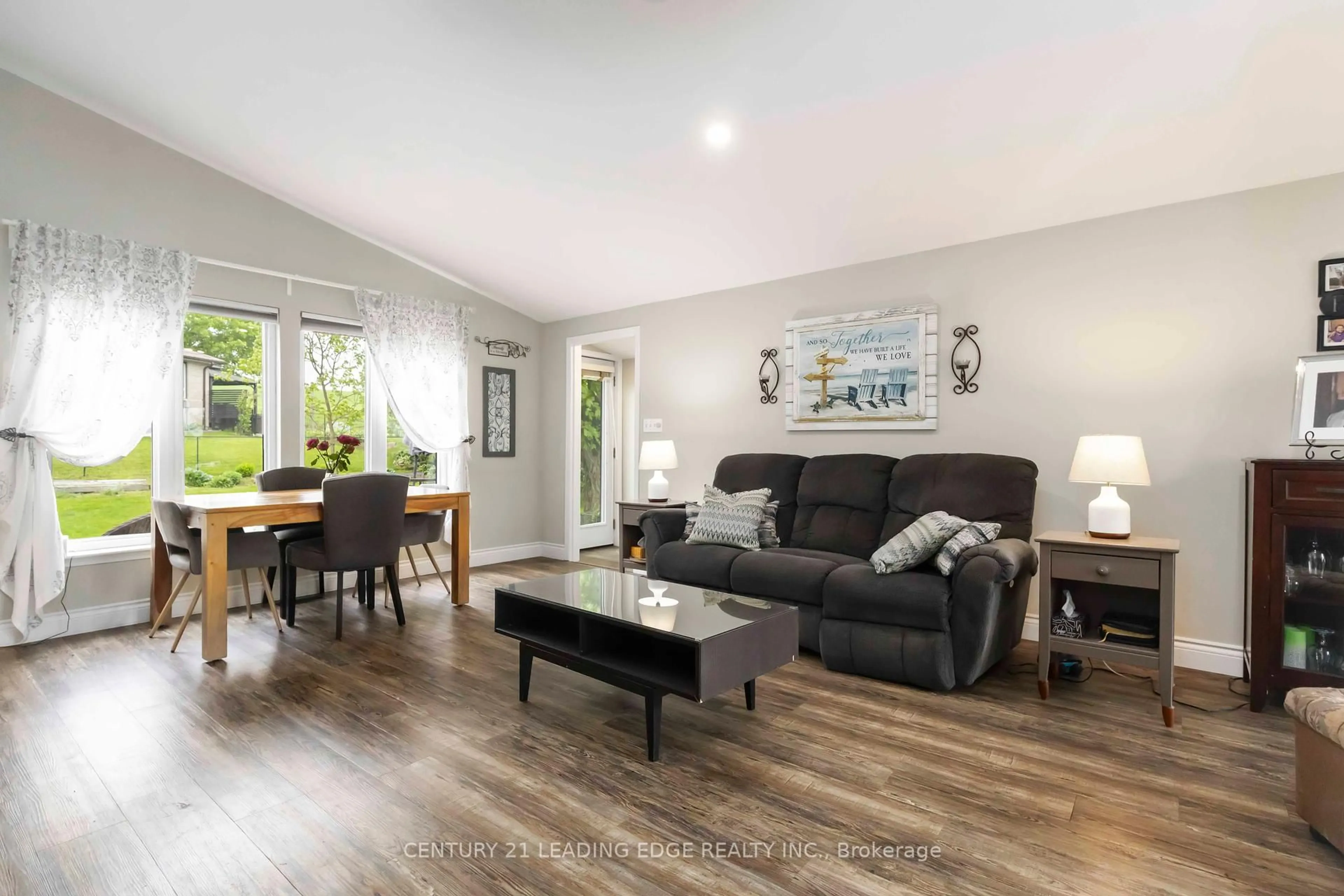 Living room with furniture, wood/laminate floor for 164 Snug Harbour Rd, Kawartha Lakes Ontario K9V 4R6