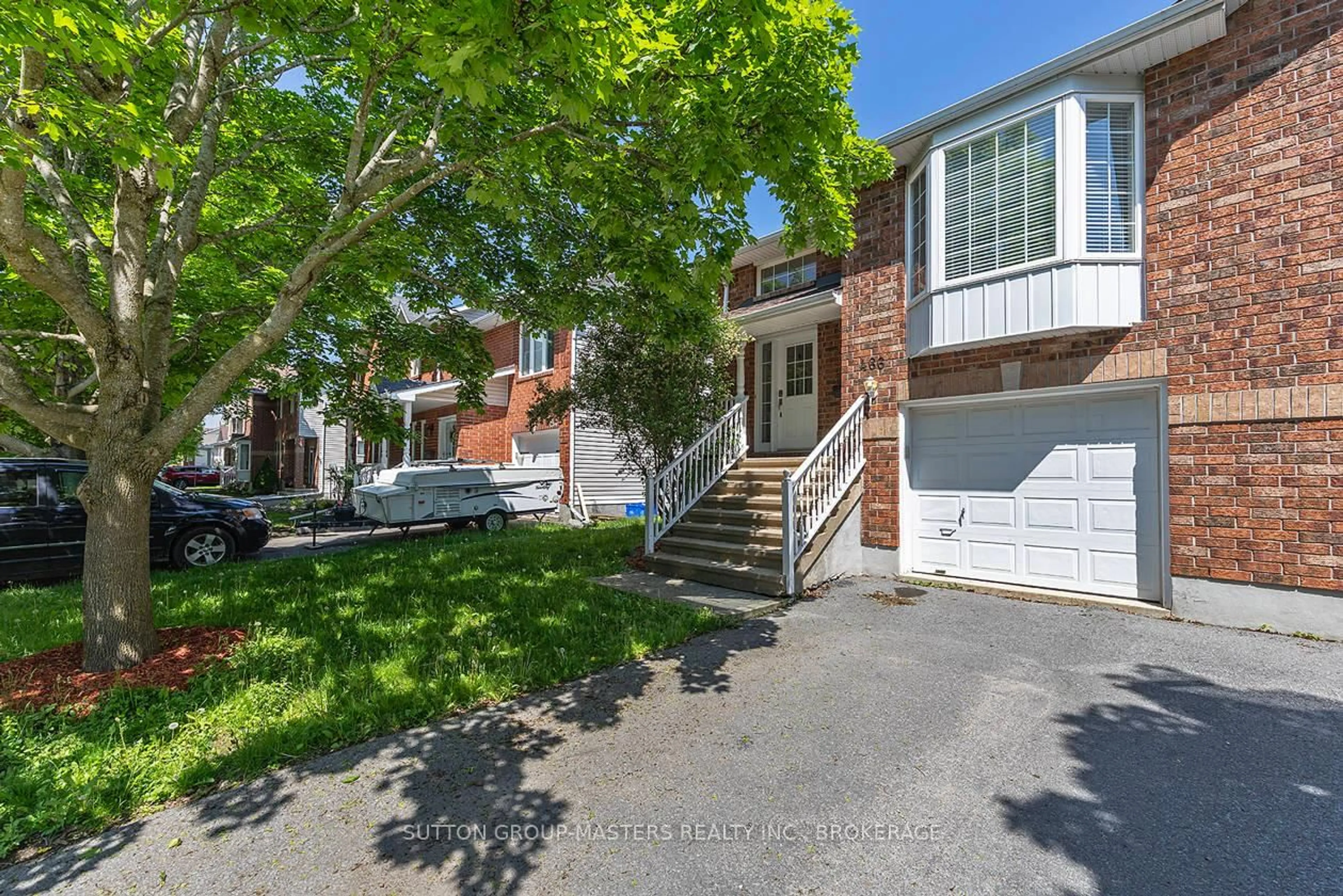 A pic from outside/outdoor area/front of a property/back of a property/a pic from drone, street for 466 Fieldstone Dr, Kingston Ontario K7K 7E4