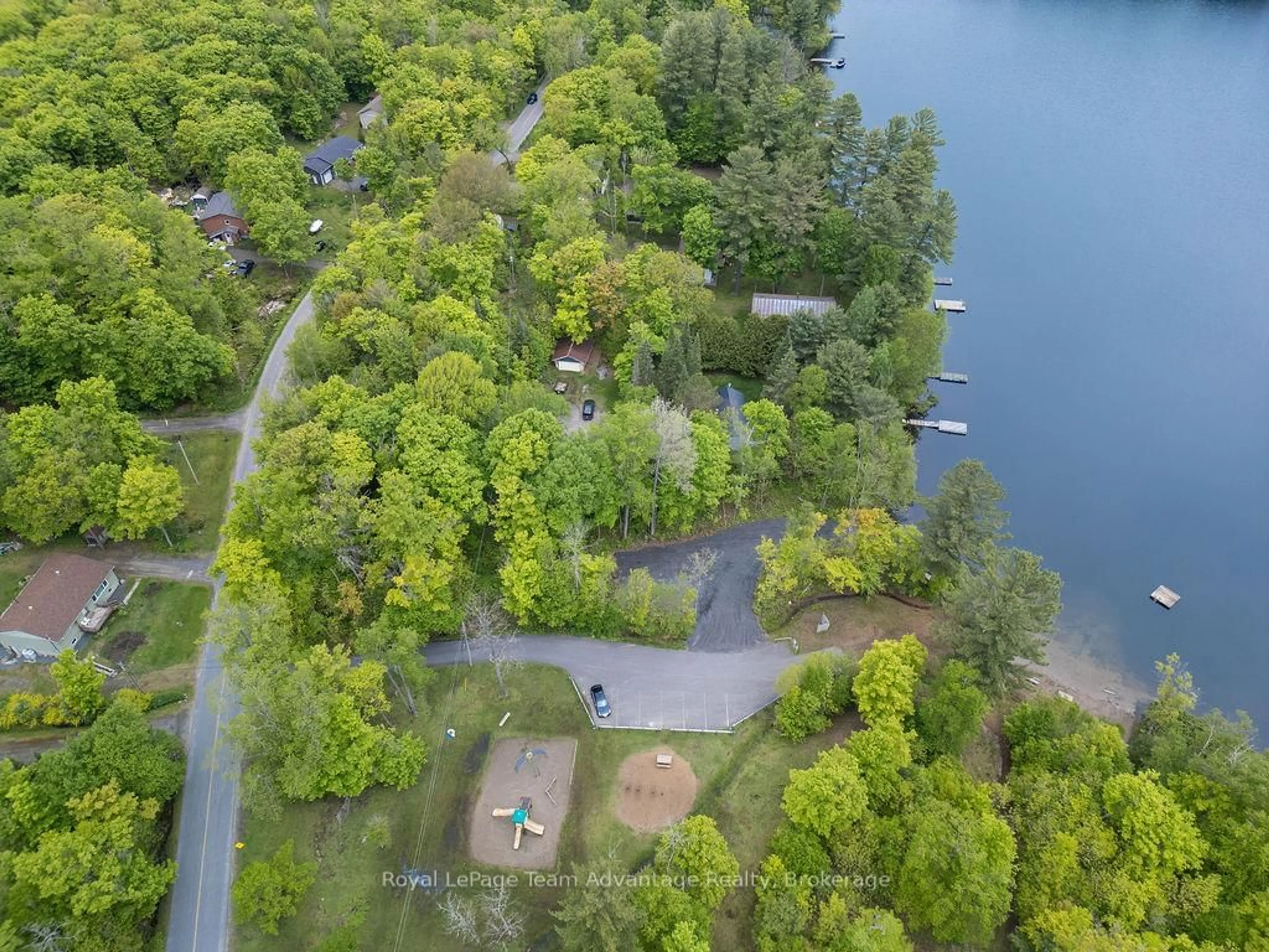 A pic from outside/outdoor area/front of a property/back of a property/a pic from drone, water/lake/river/ocean view for 14 Beaver Tr, McDougall Ontario P2A 2W7