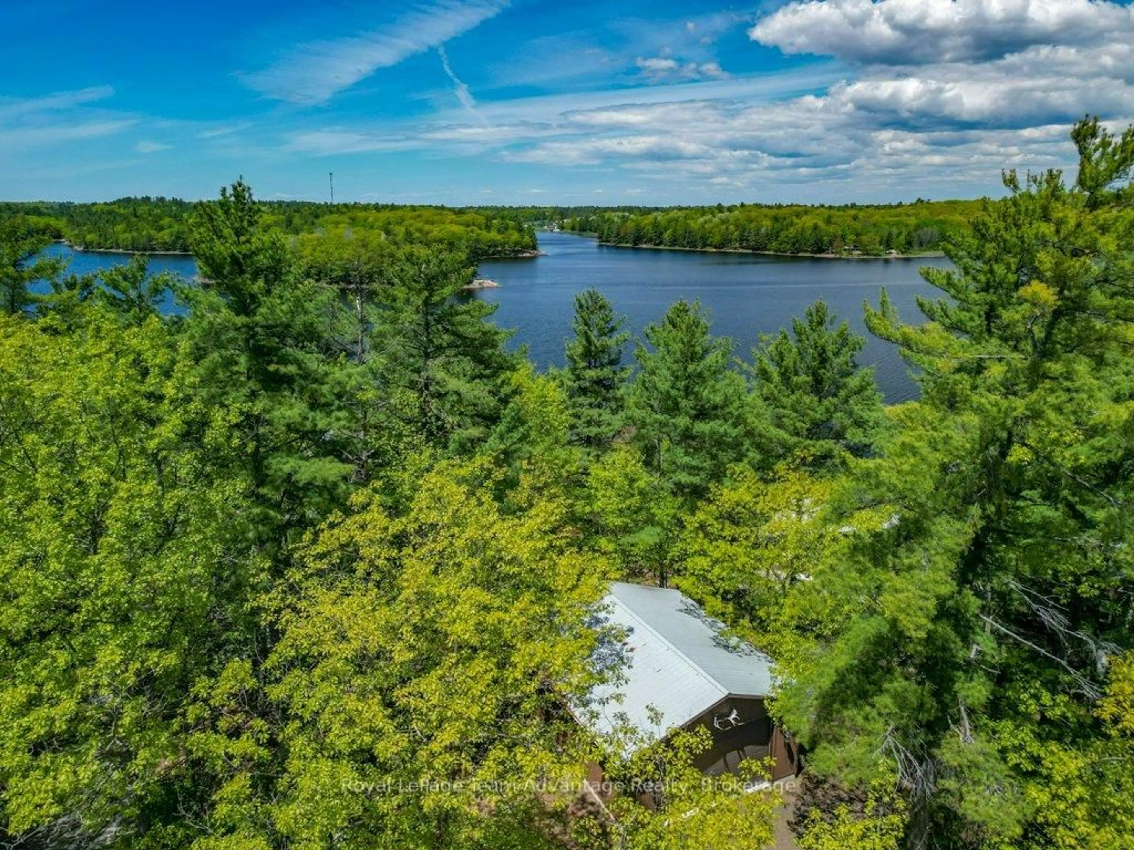 A pic from outside/outdoor area/front of a property/back of a property/a pic from drone, water/lake/river/ocean view for 47 Ridgeway Dr, Carling Ontario P0G 1G0