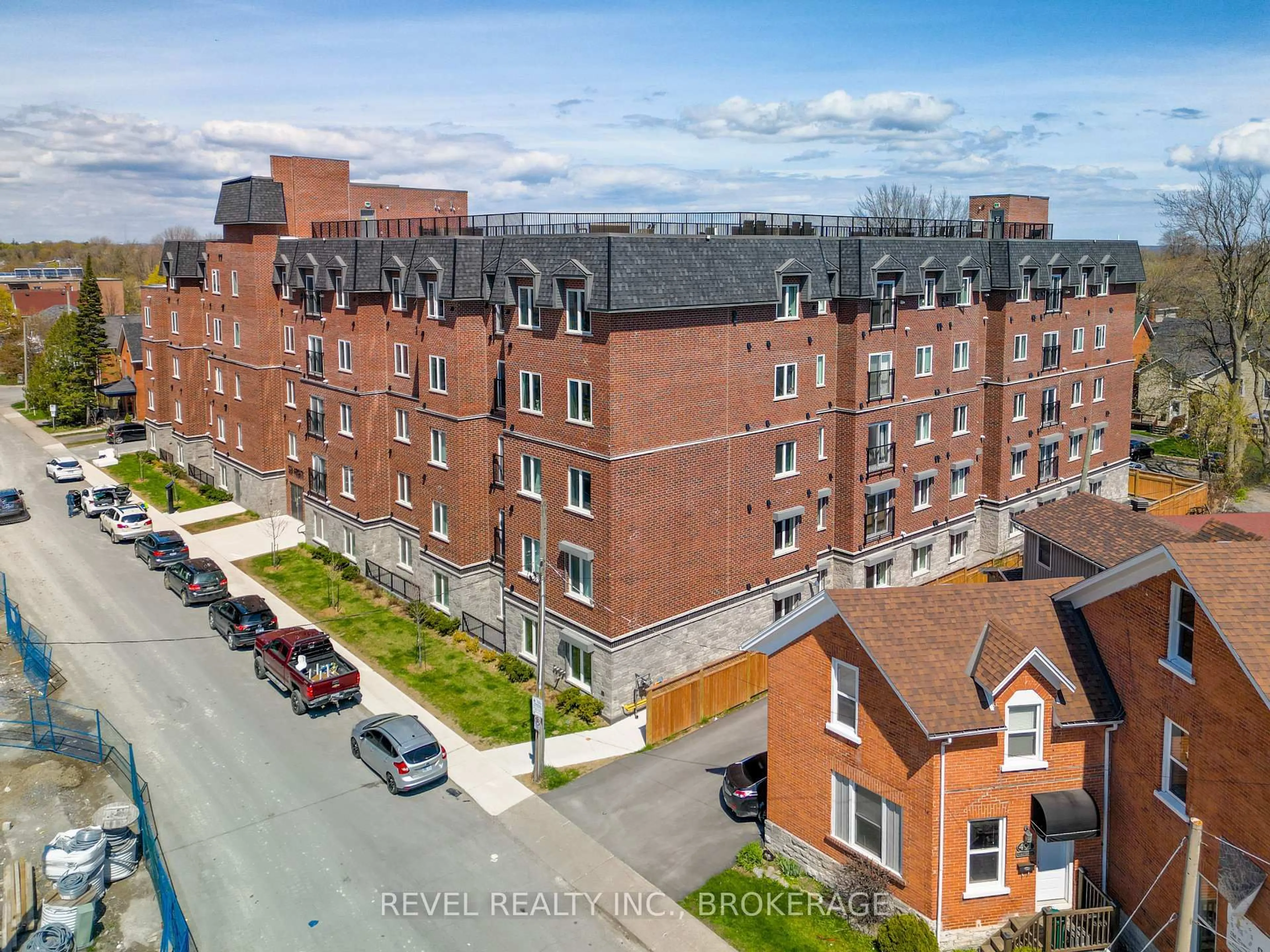 A pic from outside/outdoor area/front of a property/back of a property/a pic from drone, city buildings view from balcony for 501 Frontenac St #117, Kingston Ontario K7K 4L9