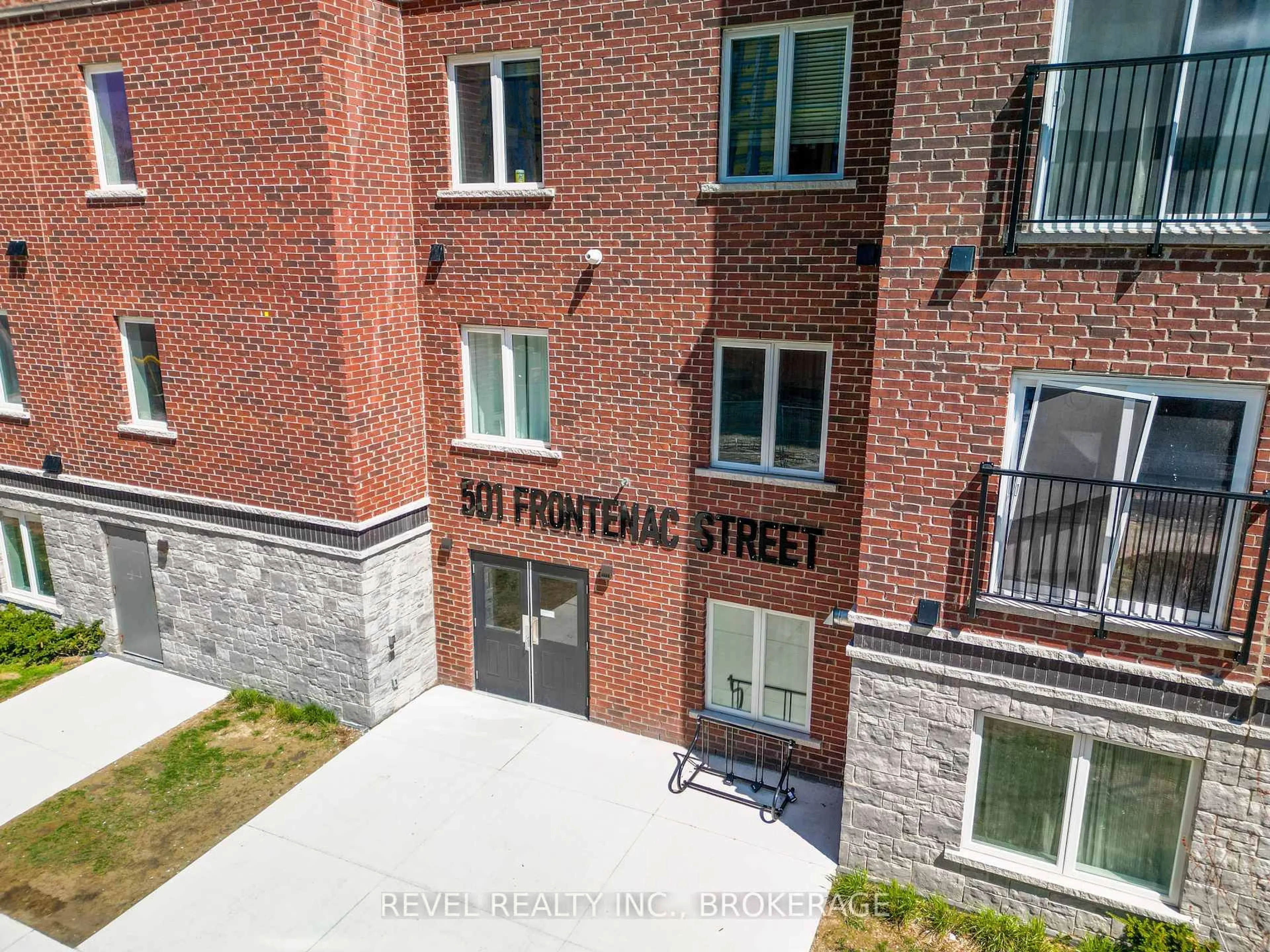 A pic from outside/outdoor area/front of a property/back of a property/a pic from drone, street for 501 Frontenac St #117, Kingston Ontario K7K 4L9
