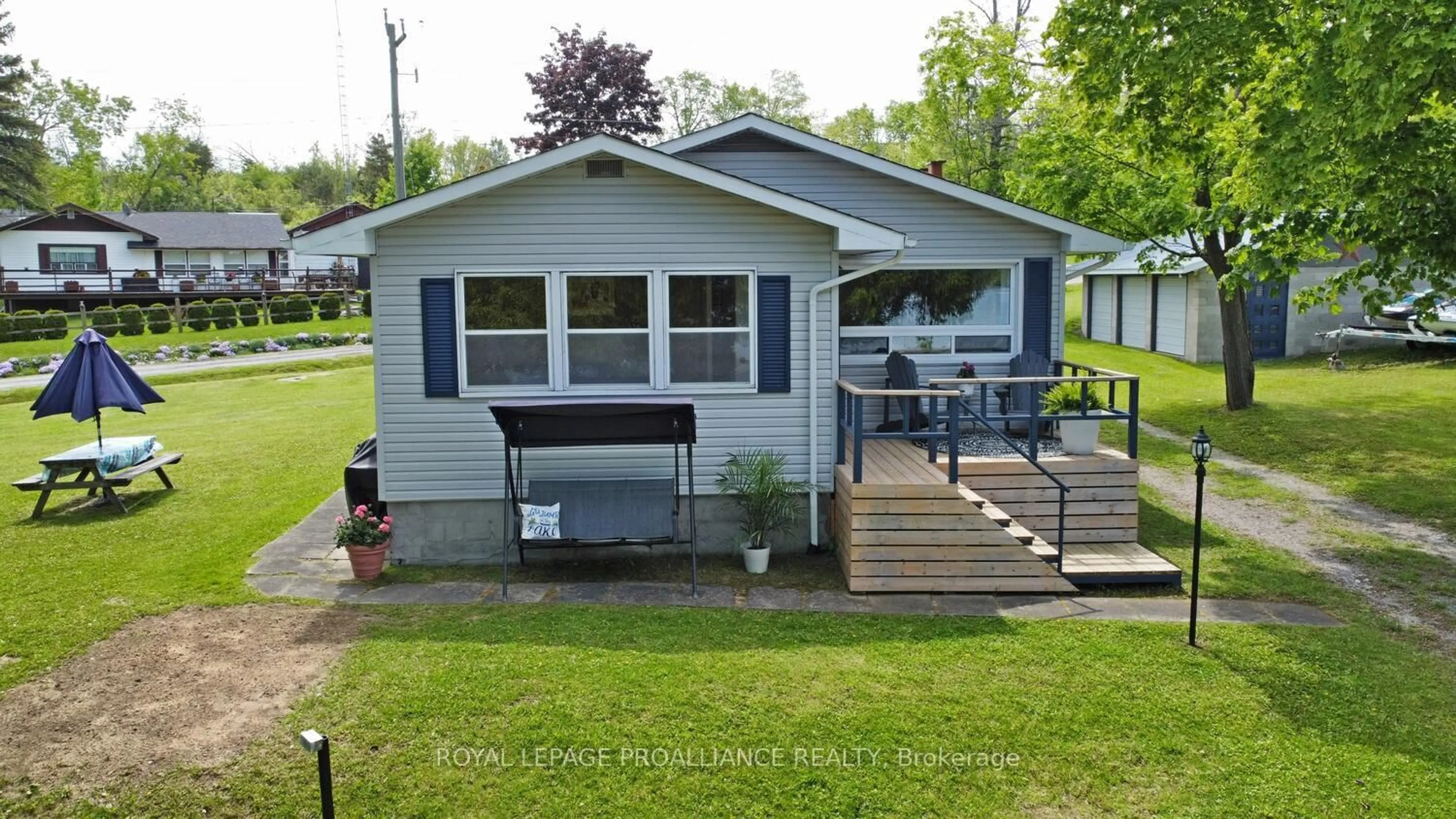 Home with vinyl exterior material, street for 64 Langs Rd, Alnwick/Haldimand Ontario K0K 2X0