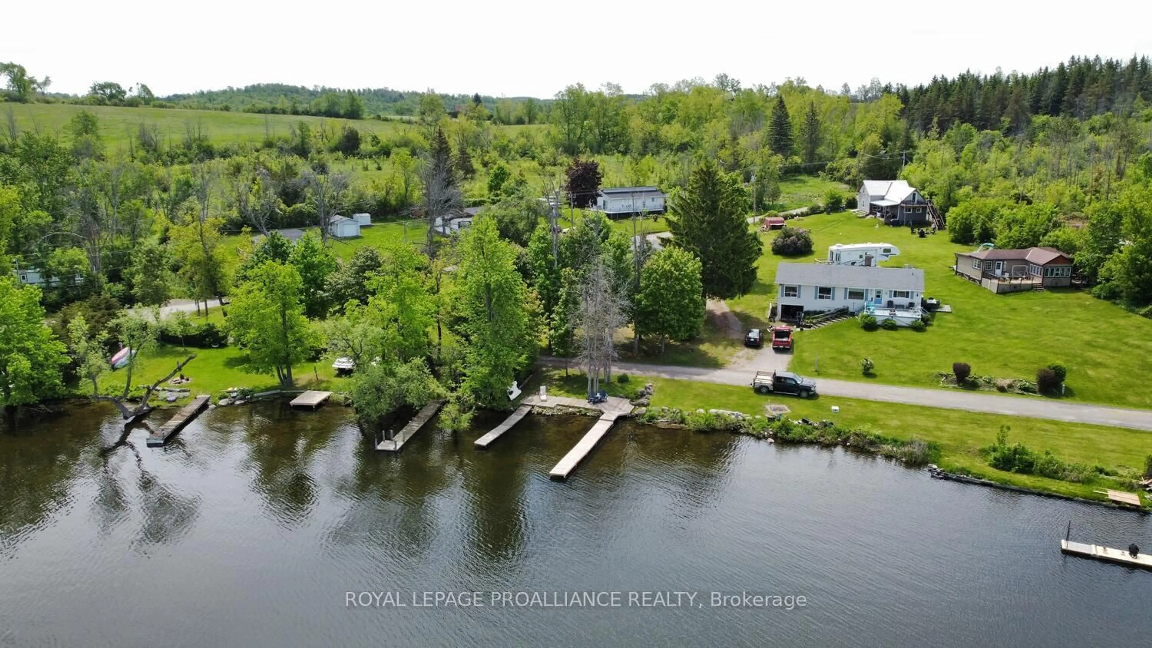 A pic from outside/outdoor area/front of a property/back of a property/a pic from drone, water/lake/river/ocean view for 64 Langs Rd, Alnwick/Haldimand Ontario K0K 2X0