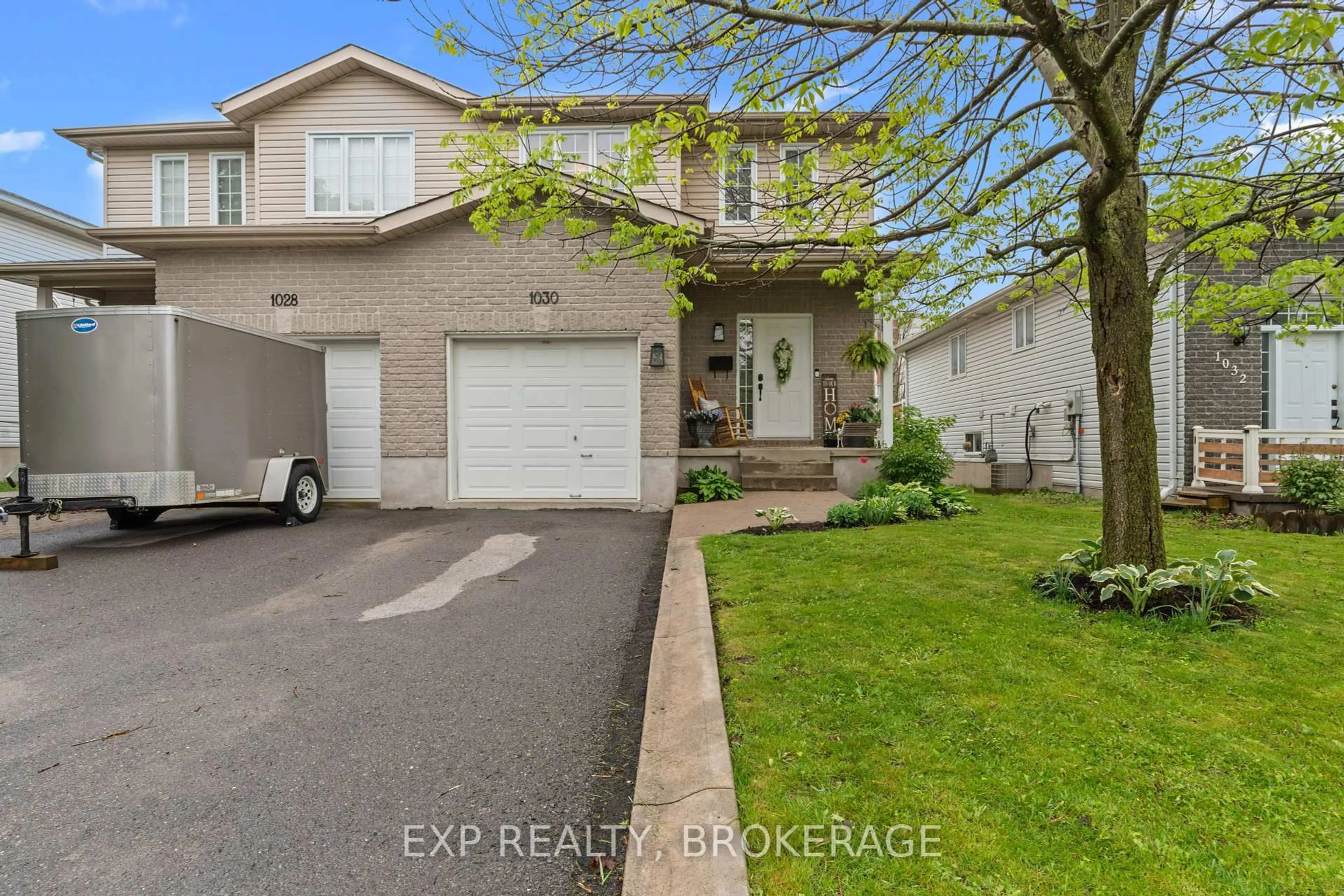 A pic from outside/outdoor area/front of a property/back of a property/a pic from drone, street for 1030 REDWOOD Cres, Kingston Ontario K7P 3G7