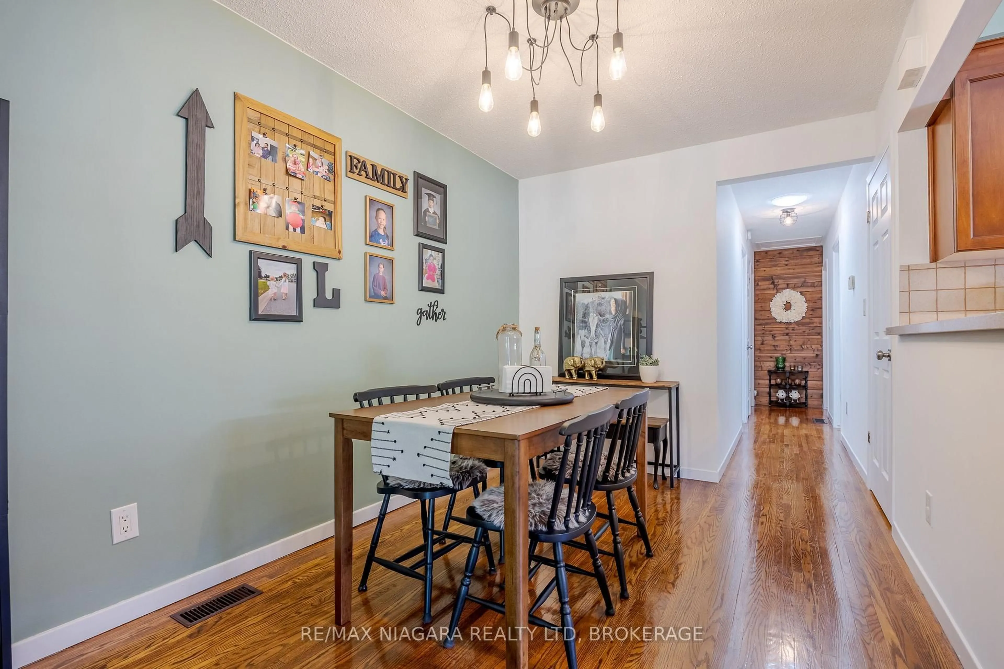 Dining room, wood/laminate floor for 42 Seymour Ave, St. Catharines Ontario L2P 1A7