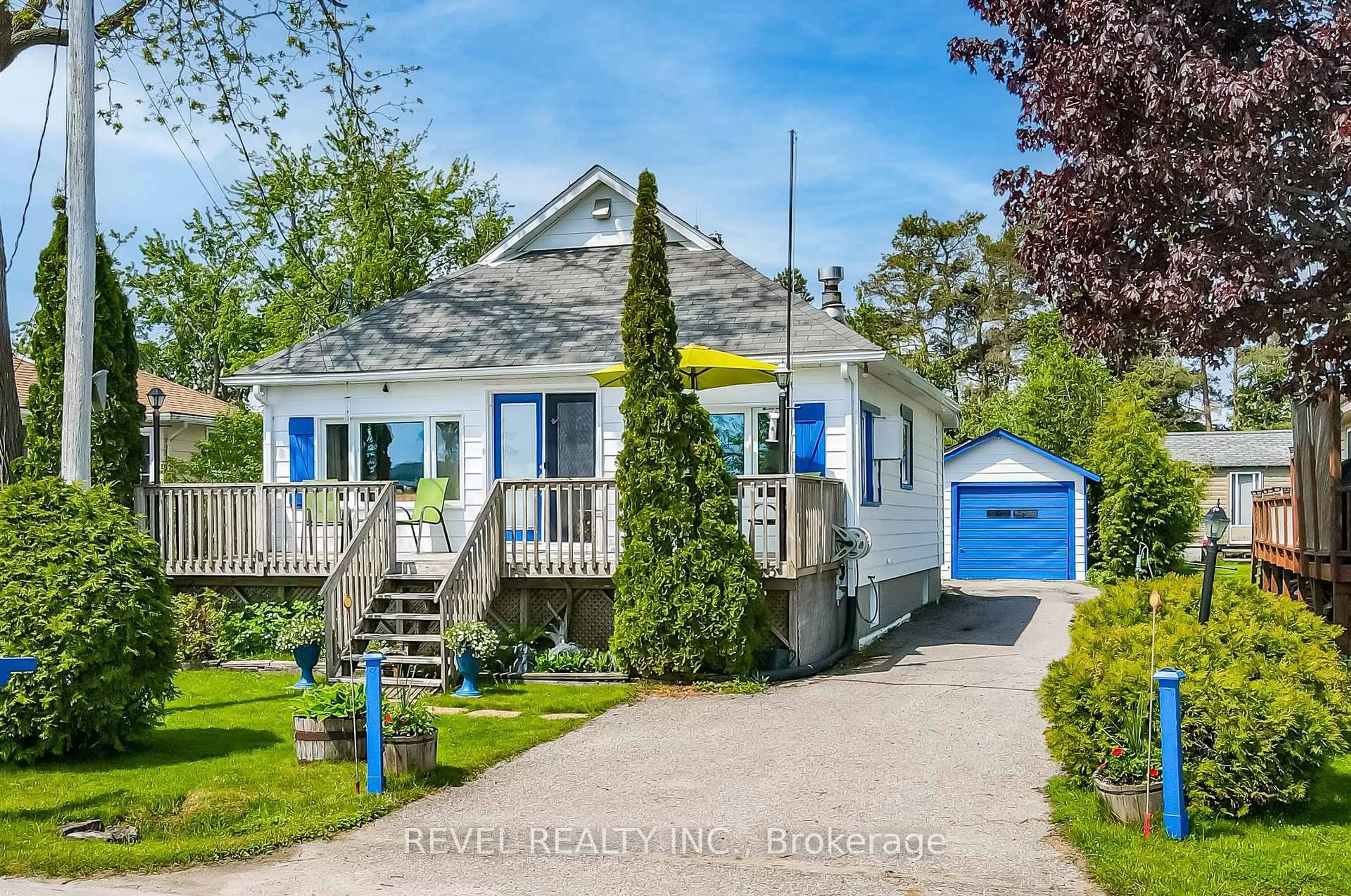 Home with vinyl exterior material, street for 483 Long Beach Rd, Kawartha Lakes Ontario K0M 1G0