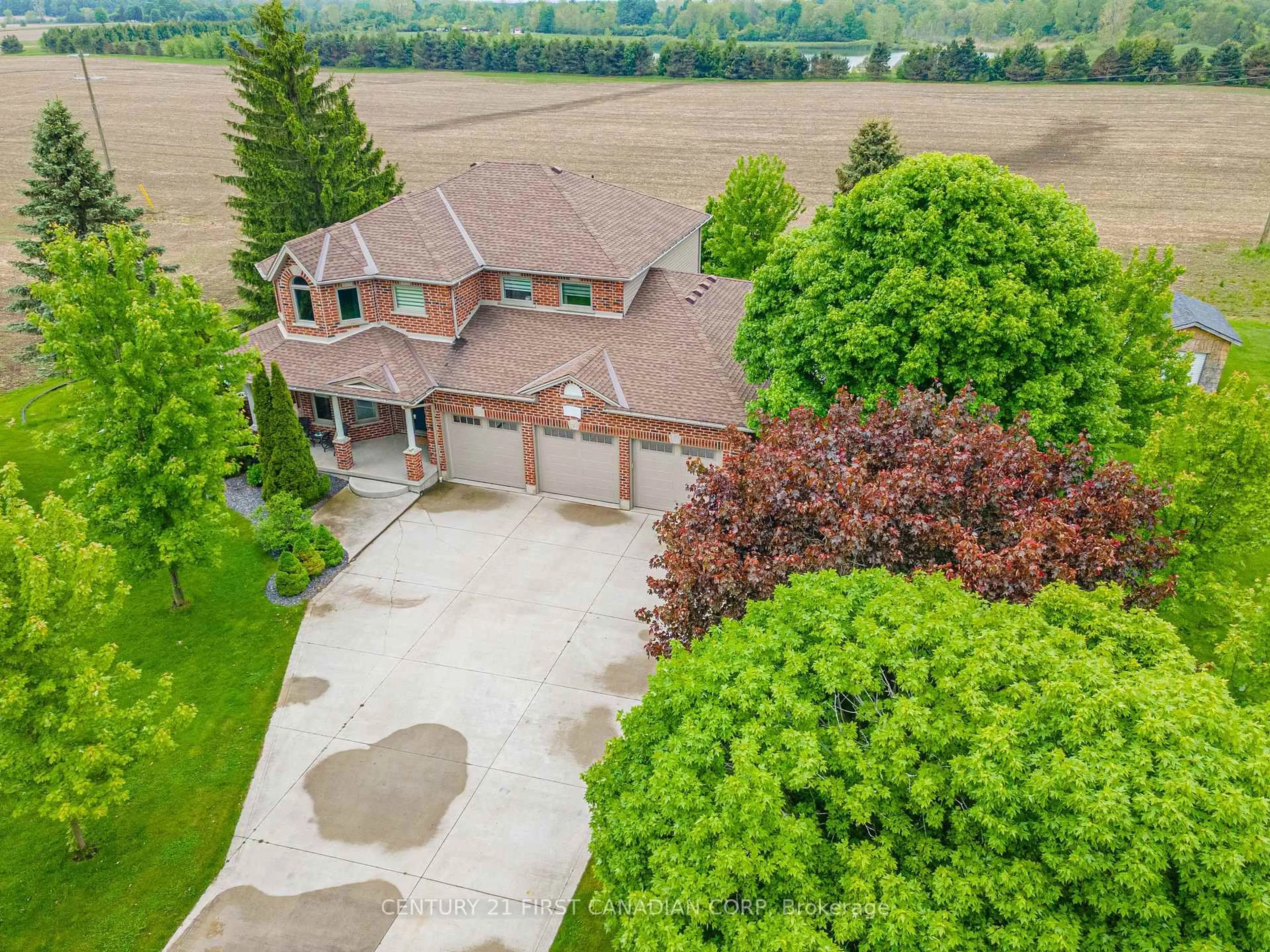 A pic from outside/outdoor area/front of a property/back of a property/a pic from drone, street for 23887 Denfield Rd, Middlesex Centre Ontario N0M 1P0
