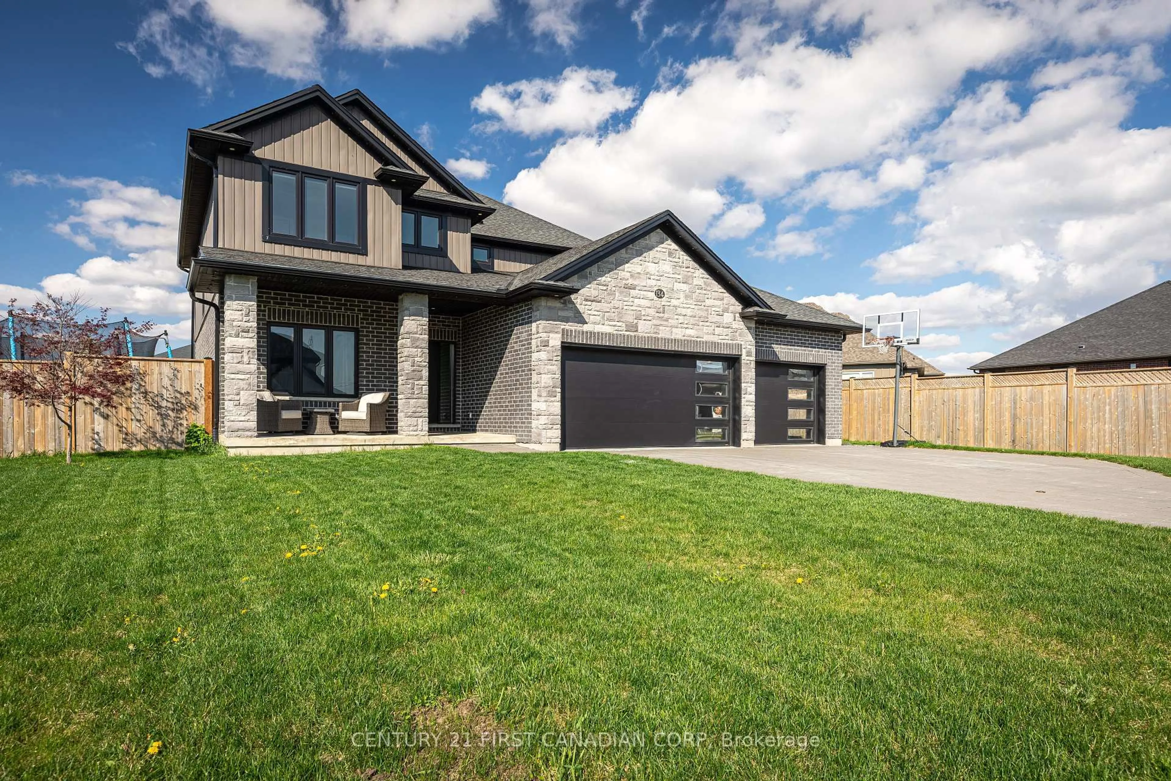 Home with brick exterior material, street for 134 Spencer Ave, Lucan Biddulph Ontario N0M 2J0