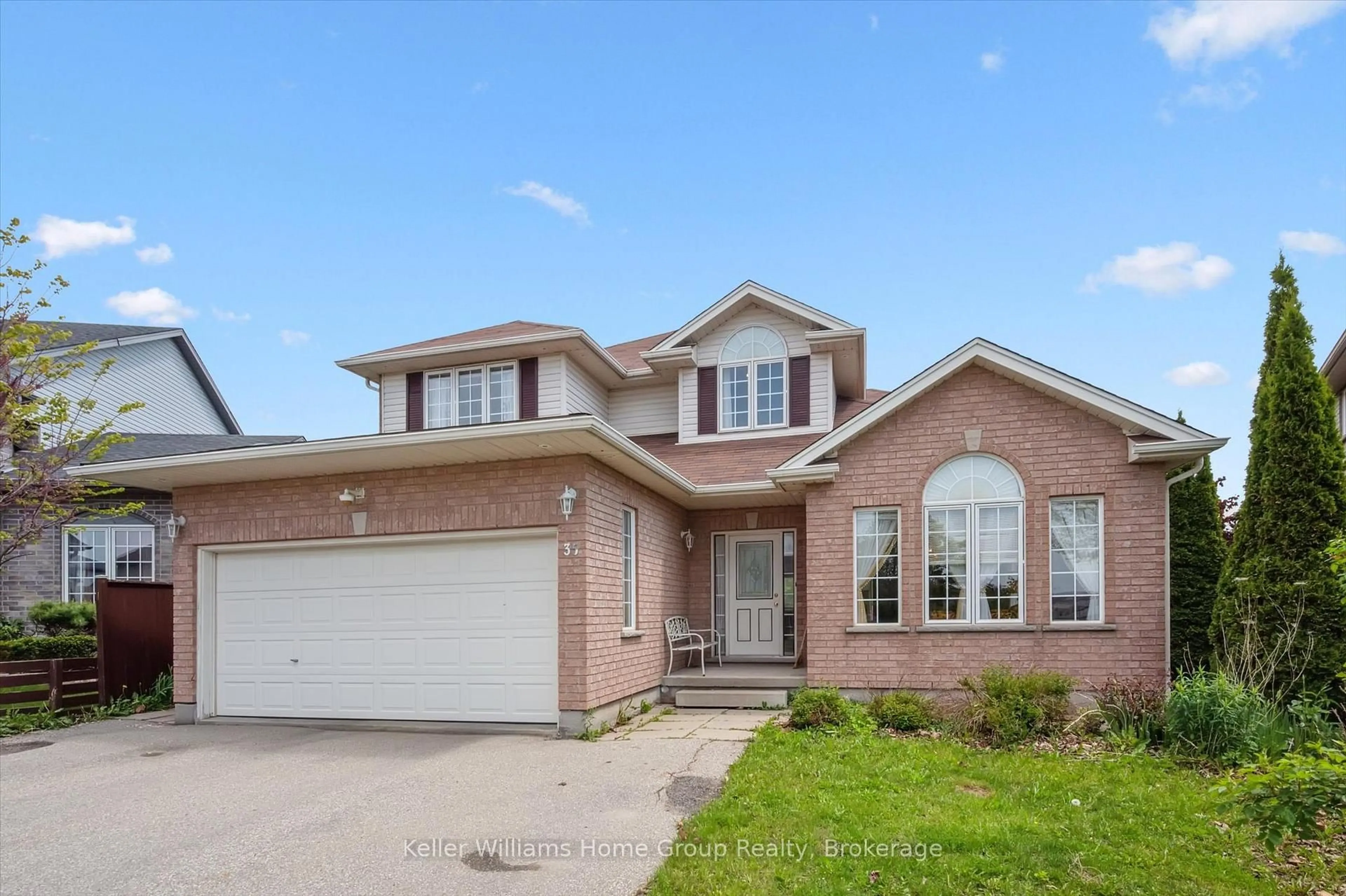 Home with brick exterior material, street for 35 Creekside Dr, Guelph Ontario N1E 0C2