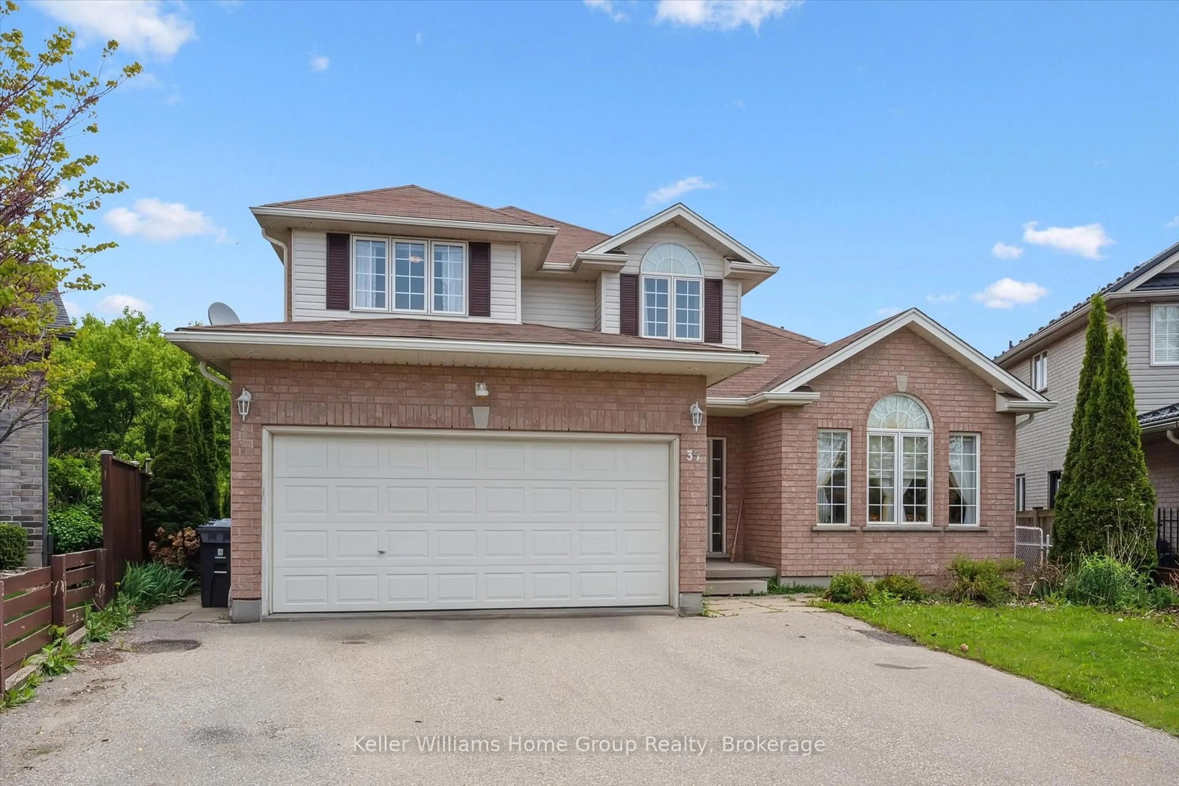 Home with brick exterior material, street for 35 Creekside Dr, Guelph Ontario N1E 0C2