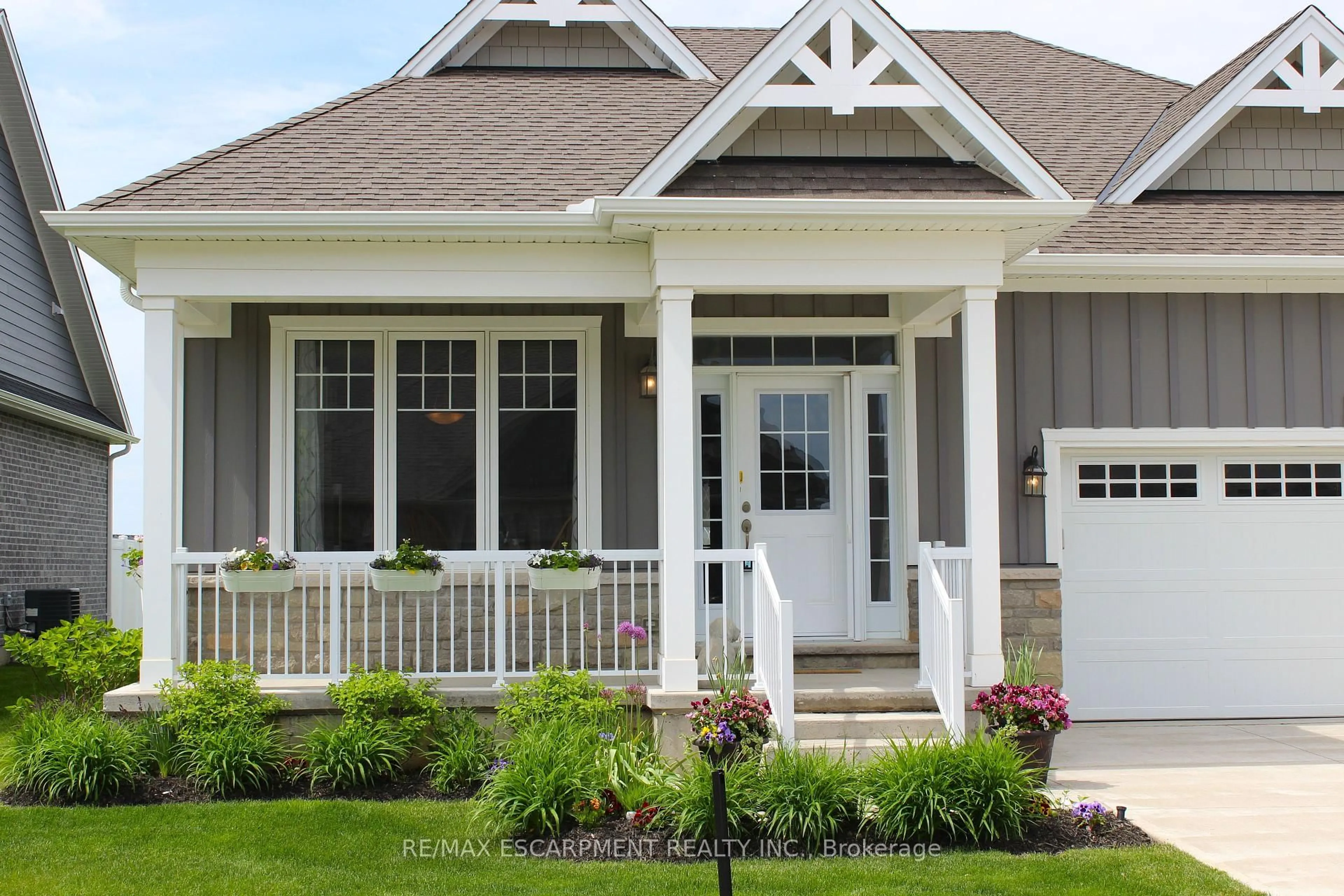 Home with vinyl exterior material, street for 238 SCHOONER Dr, Norfolk Ontario N0A 1N3