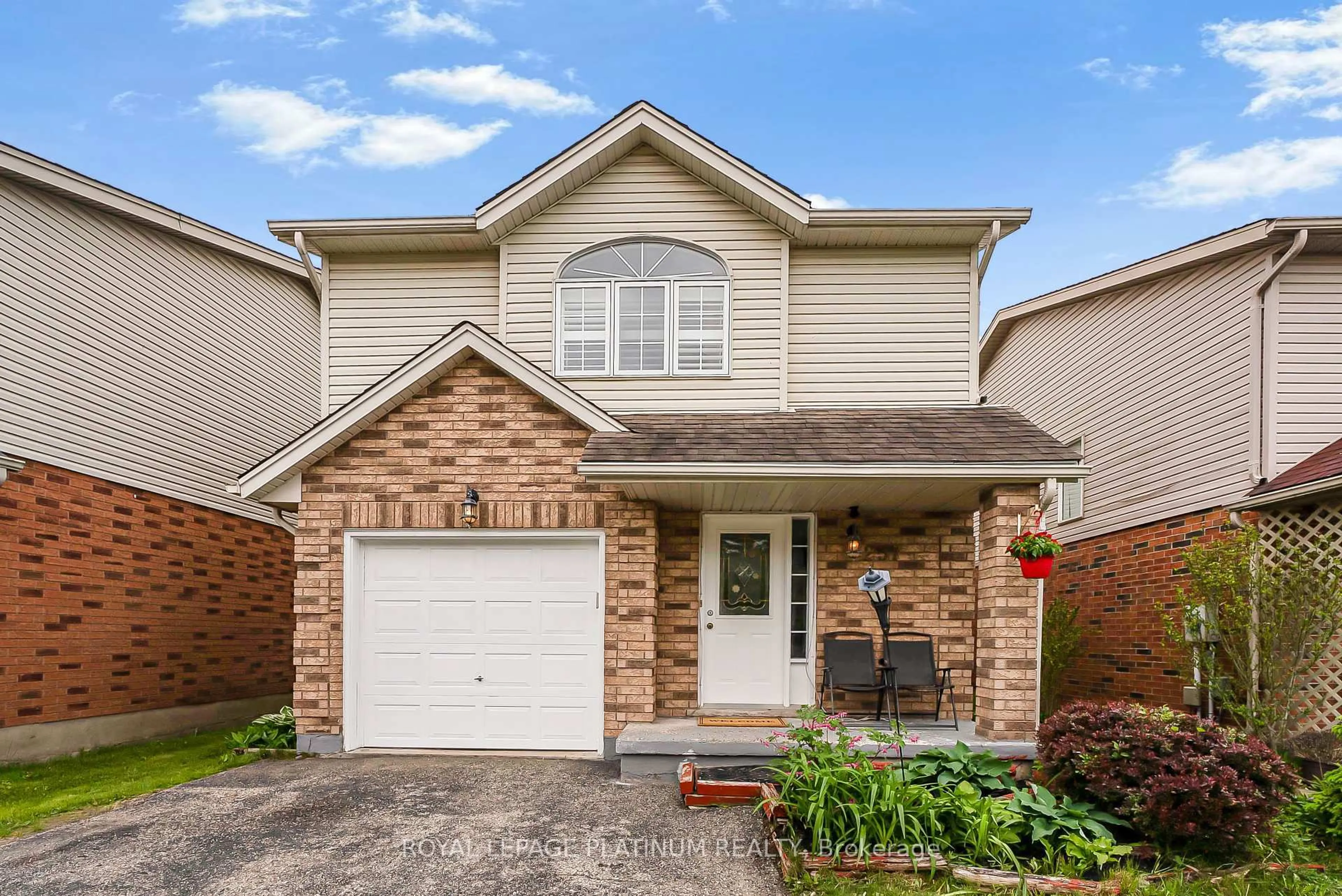 Home with brick exterior material, street for 257 Grey Fox Dr, Kitchener Ontario N2E 3N7