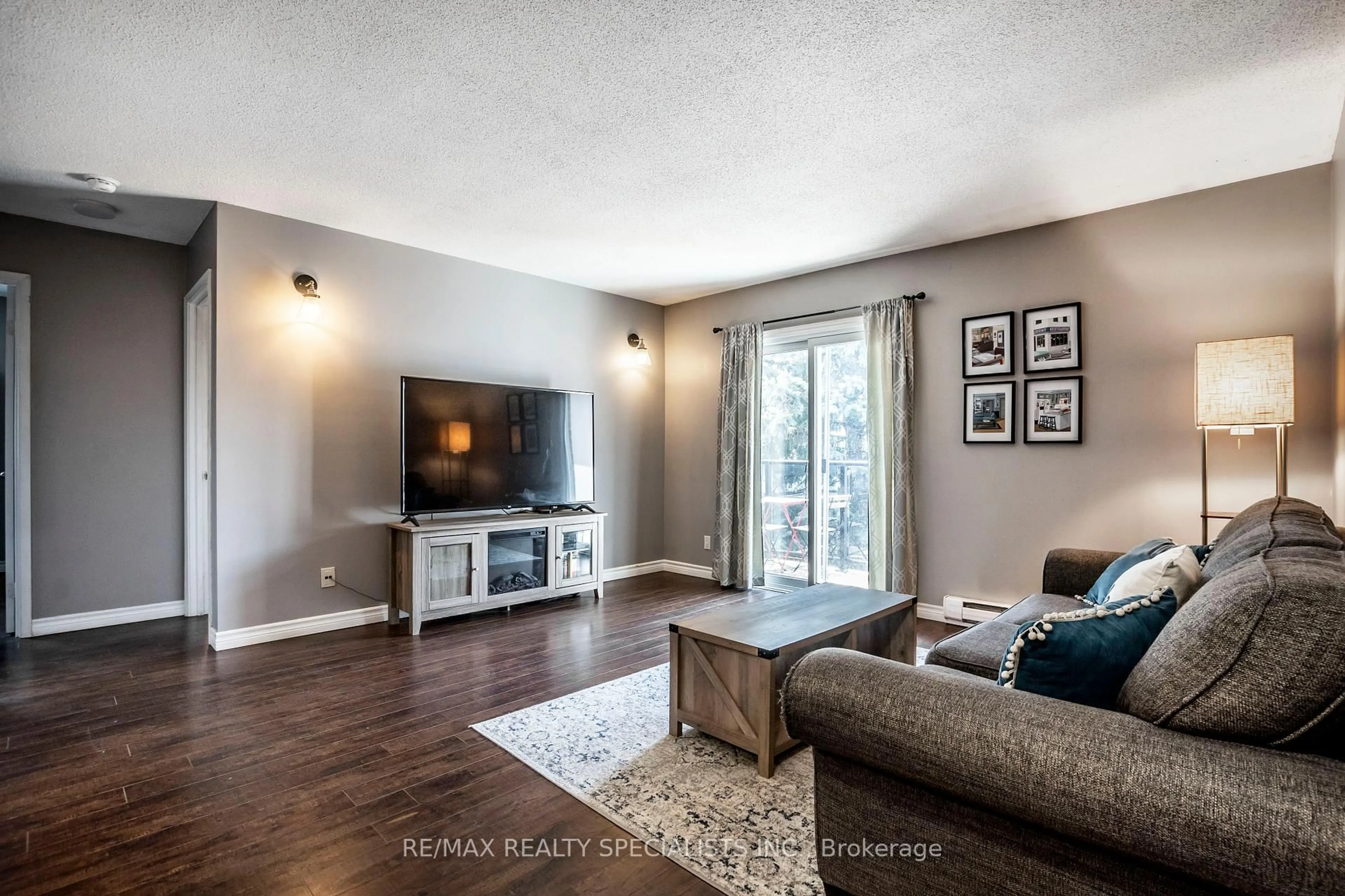 Living room with furniture, unknown for 565 Greenfield Ave #410, Kitchener Ontario N2C 2P4