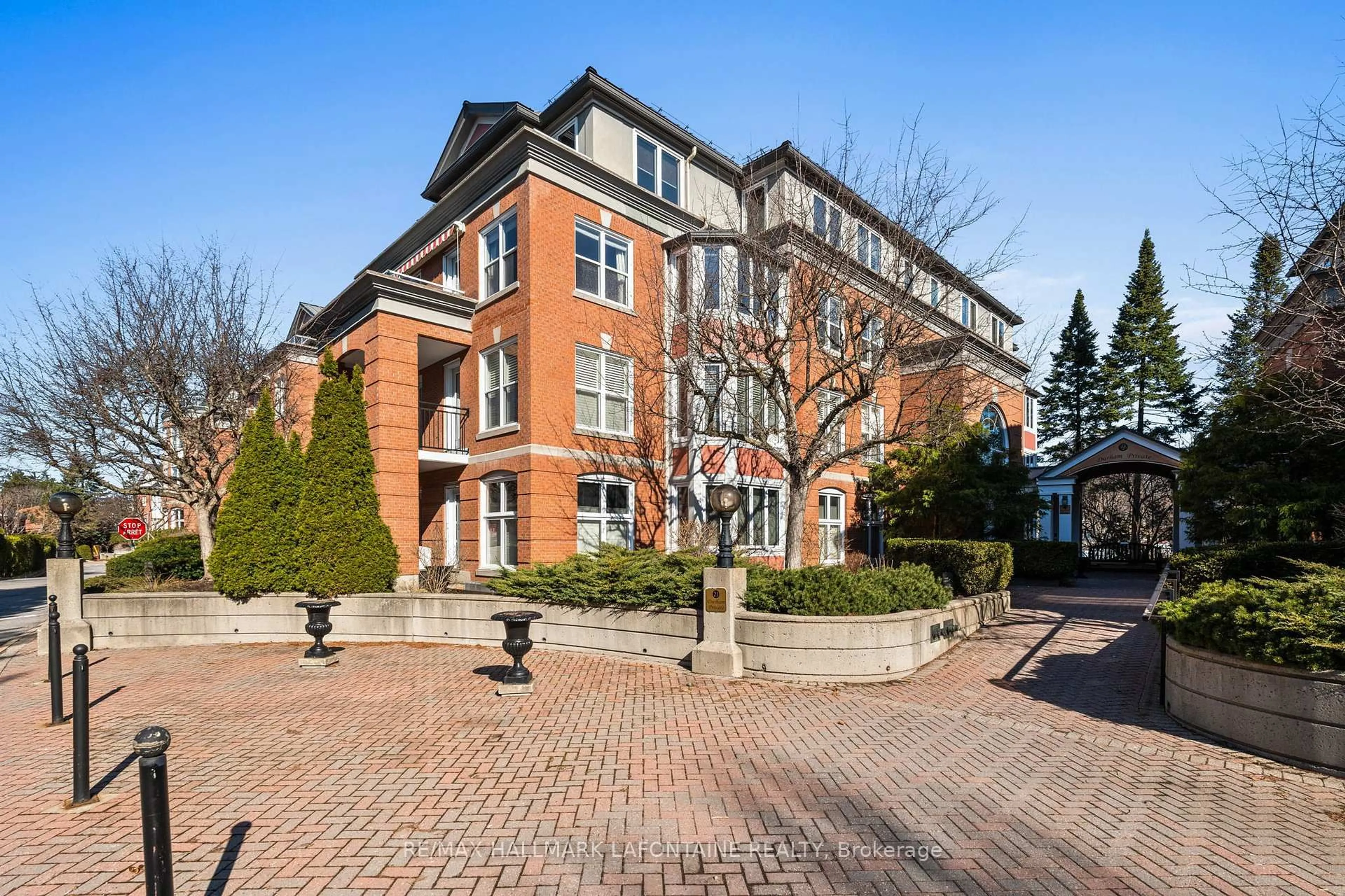 Home with brick exterior material, street for 21 Durham Private #101, Ottawa Ontario K1M 2H8