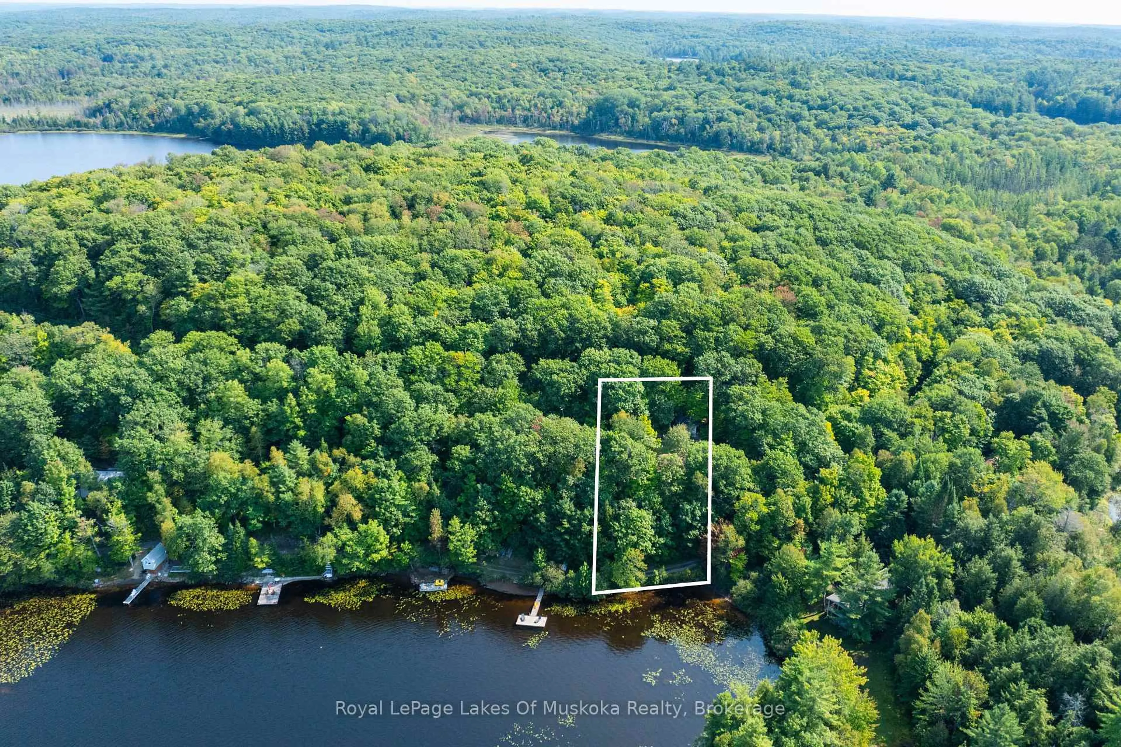 A pic from outside/outdoor area/front of a property/back of a property/a pic from drone, water/lake/river/ocean view for 1030 McCabe Rd, Lake of Bays Ontario P0B 1A0
