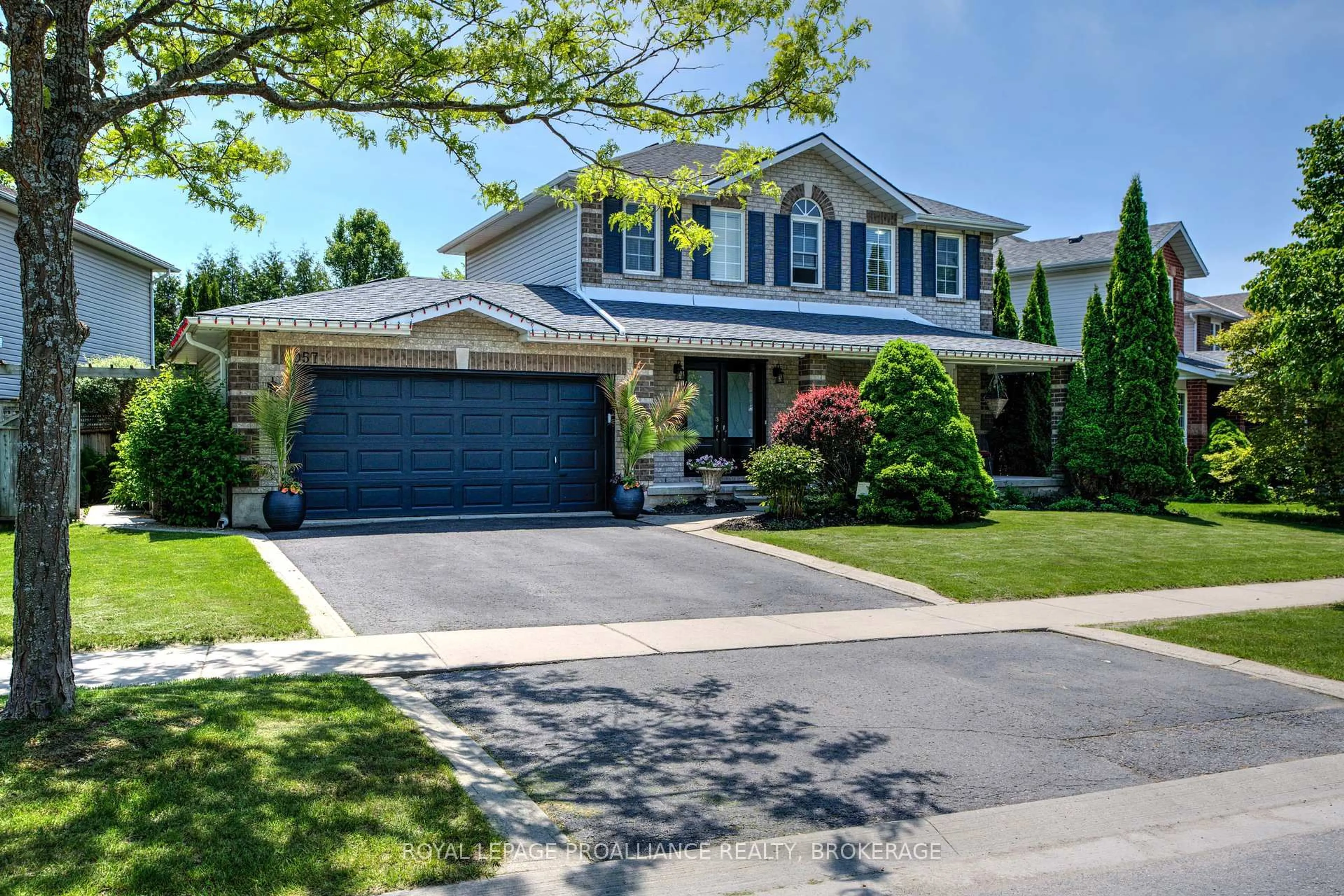 Home with vinyl exterior material, street for 1057 Wise St, Kingston Ontario K7P 3E5