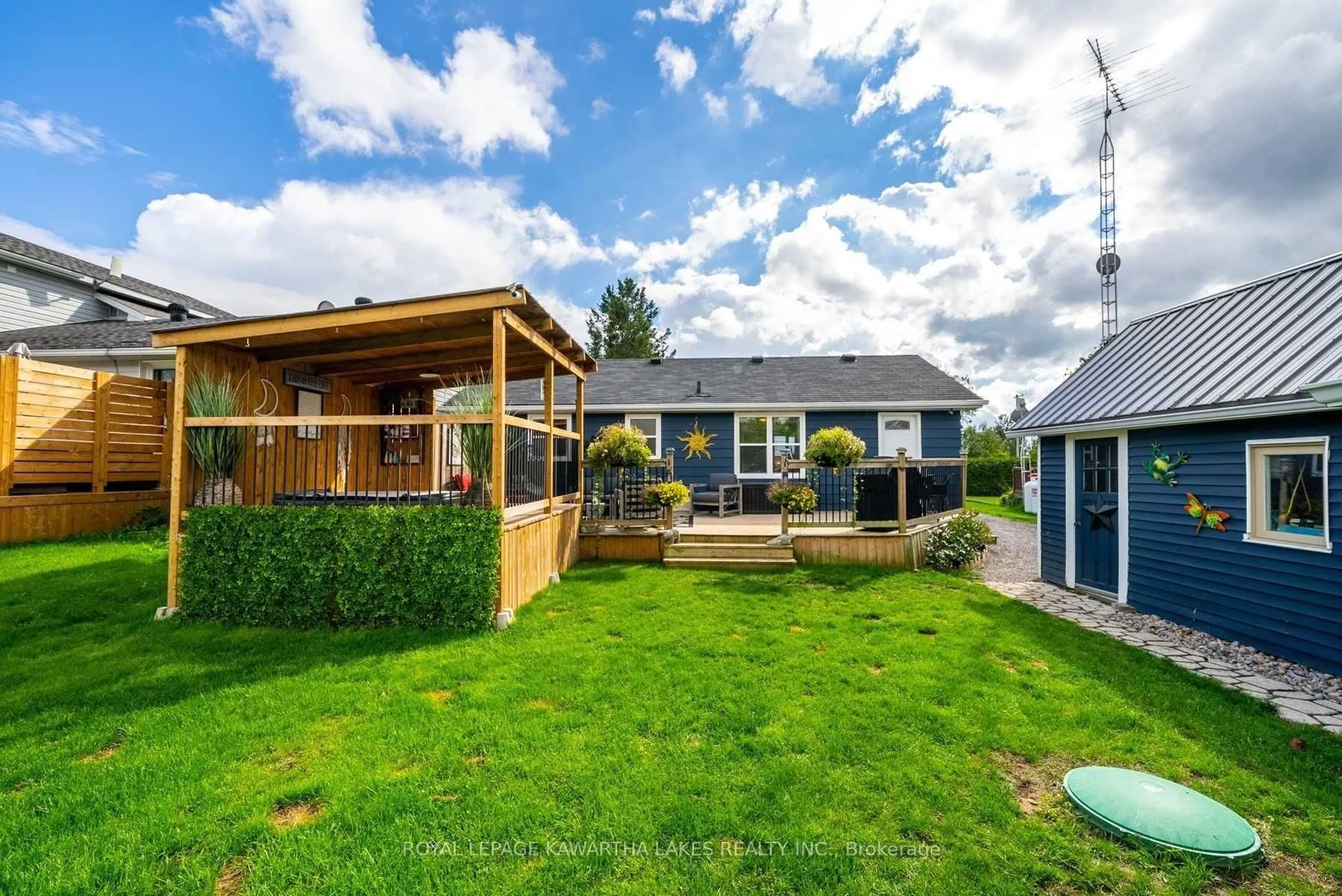 A pic from outside/outdoor area/front of a property/back of a property/a pic from drone, street for 813 County Road 121 Rd, Kawartha Lakes Ontario K0M 1N0