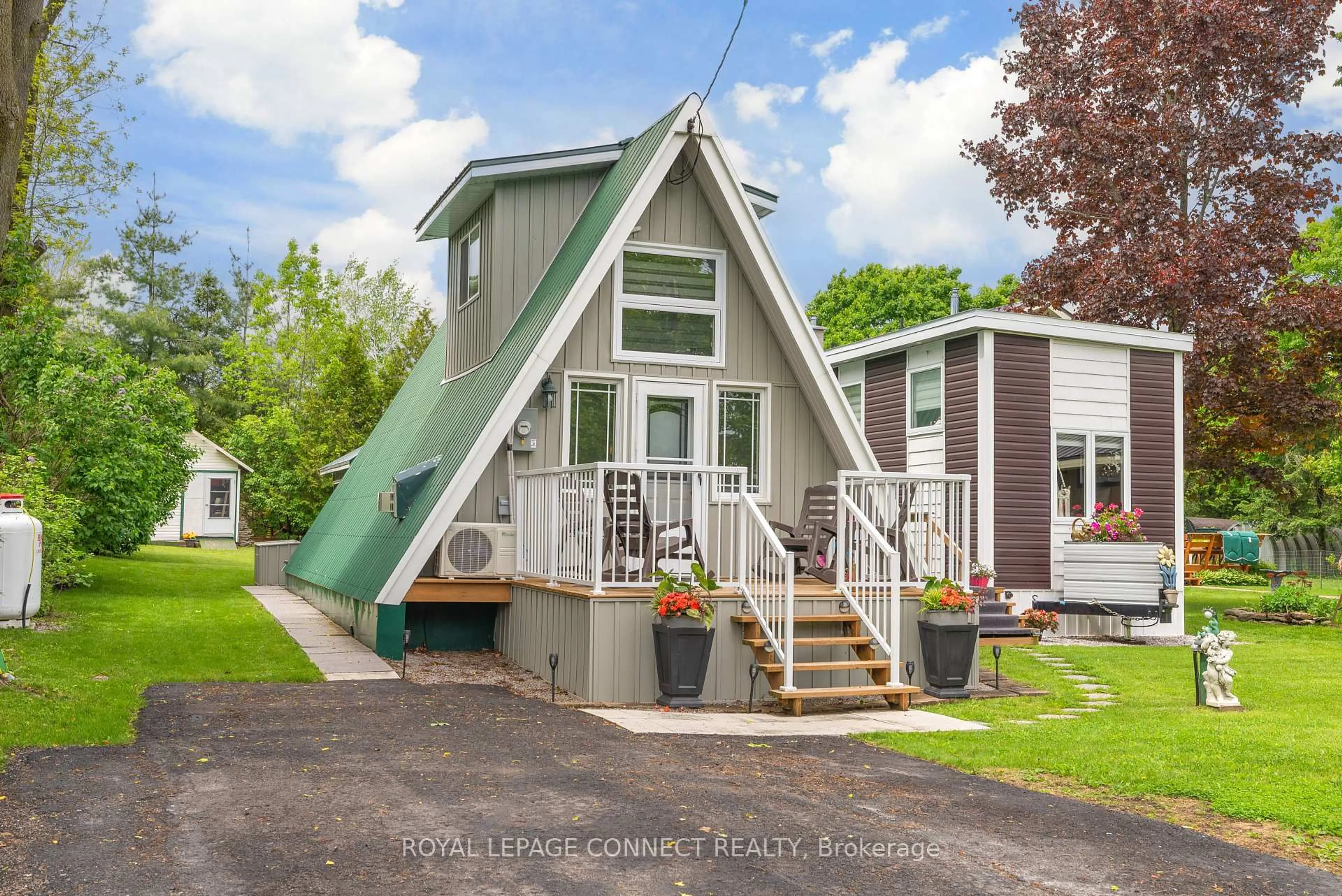 Home with vinyl exterior material, street for 31 Falls Bay Rd, Kawartha Lakes Ontario K0M 1A0