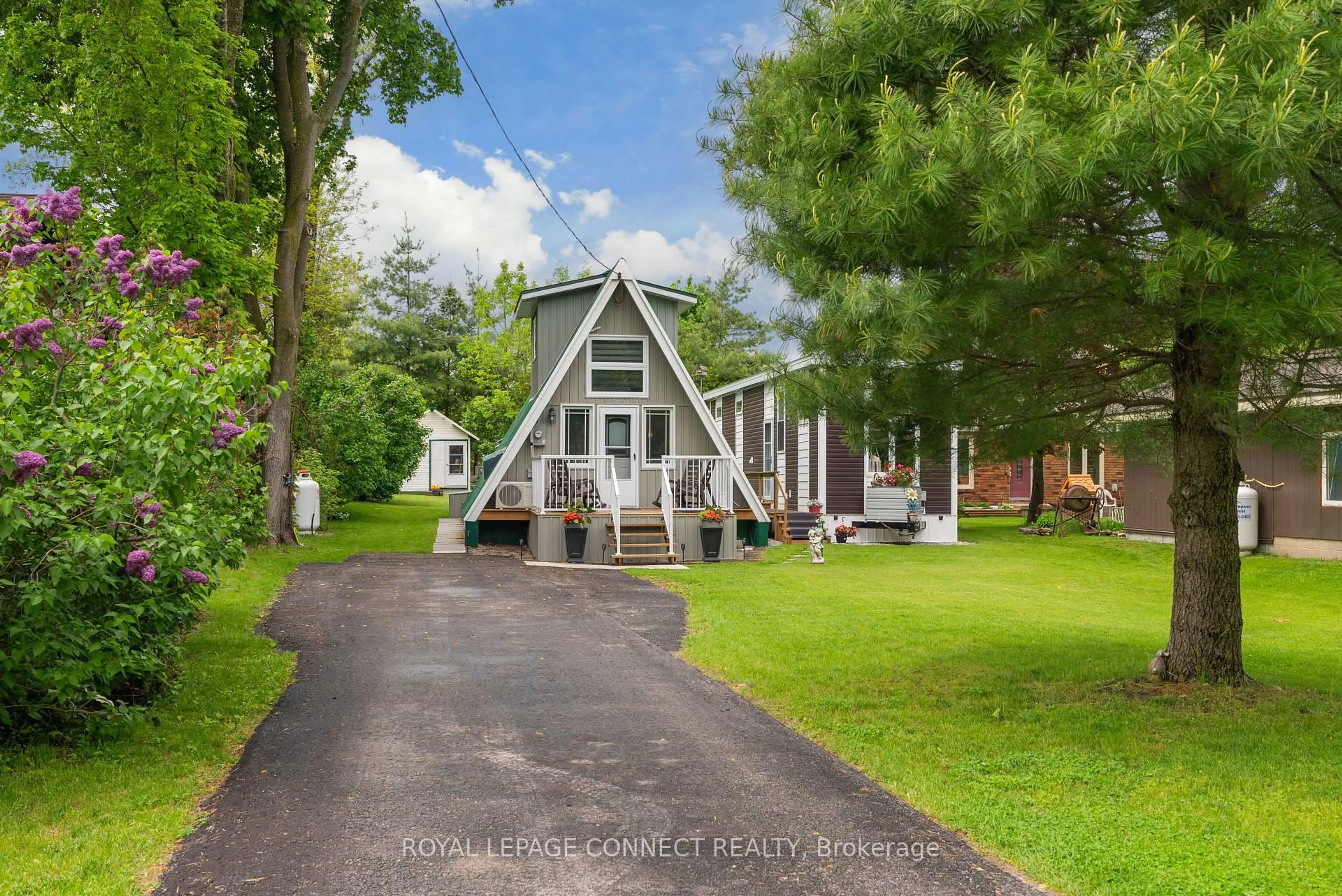 A pic from outside/outdoor area/front of a property/back of a property/a pic from drone, street for 31 Falls Bay Rd, Kawartha Lakes Ontario K0M 1A0
