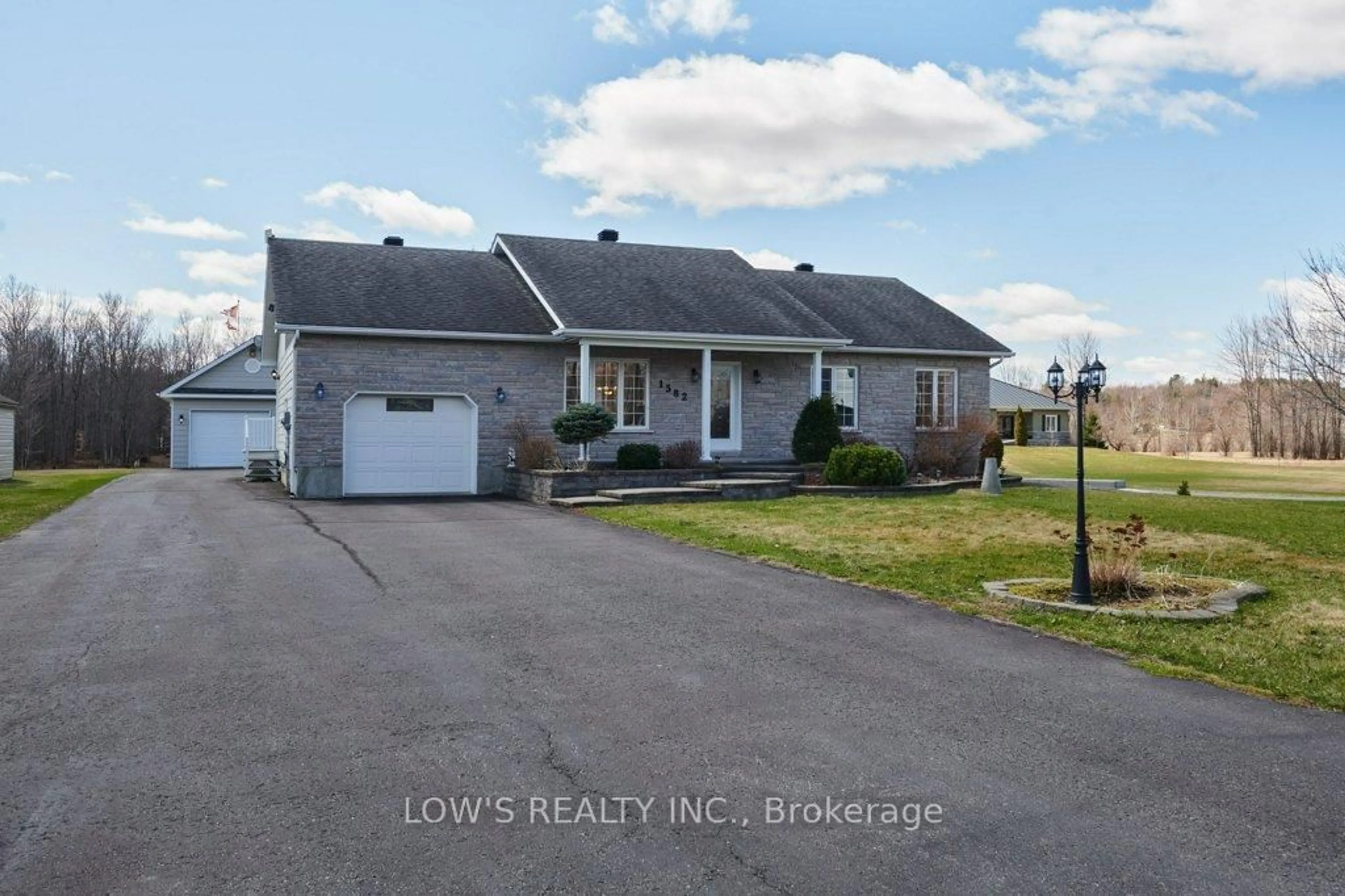 A pic from outside/outdoor area/front of a property/back of a property/a pic from drone, street for 1582 Sandy Hill Rd, Champlain Ontario K6A 2R2