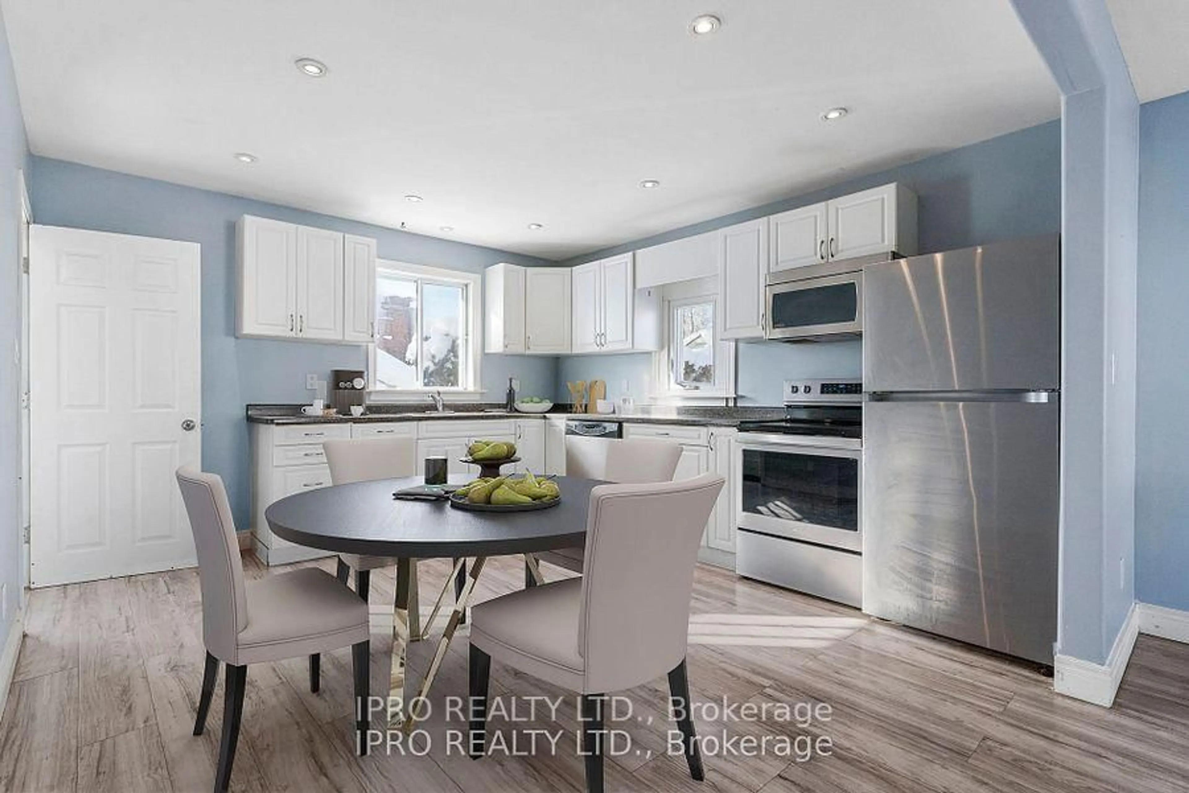 Open concept kitchen, wood/laminate floor for 355 18TH St, Owen Sound Ontario N4K 4C2