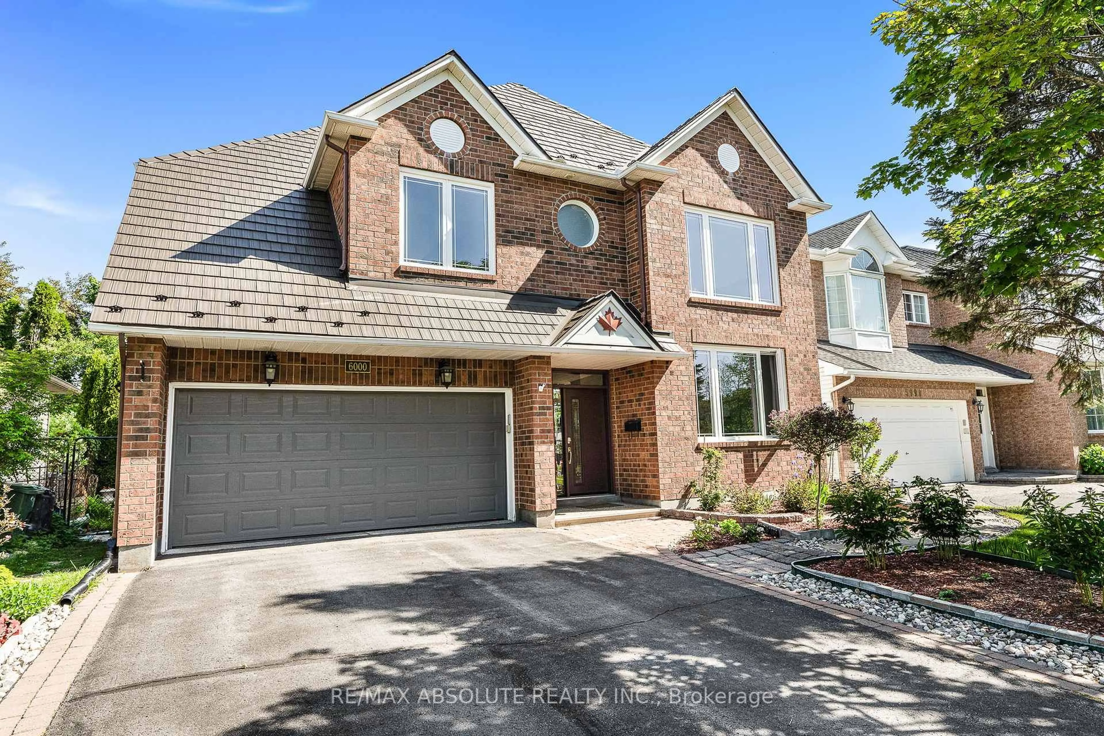 Home with brick exterior material, street for 6000 Longleaf Dr, Orleans Ontario K1W 1J2