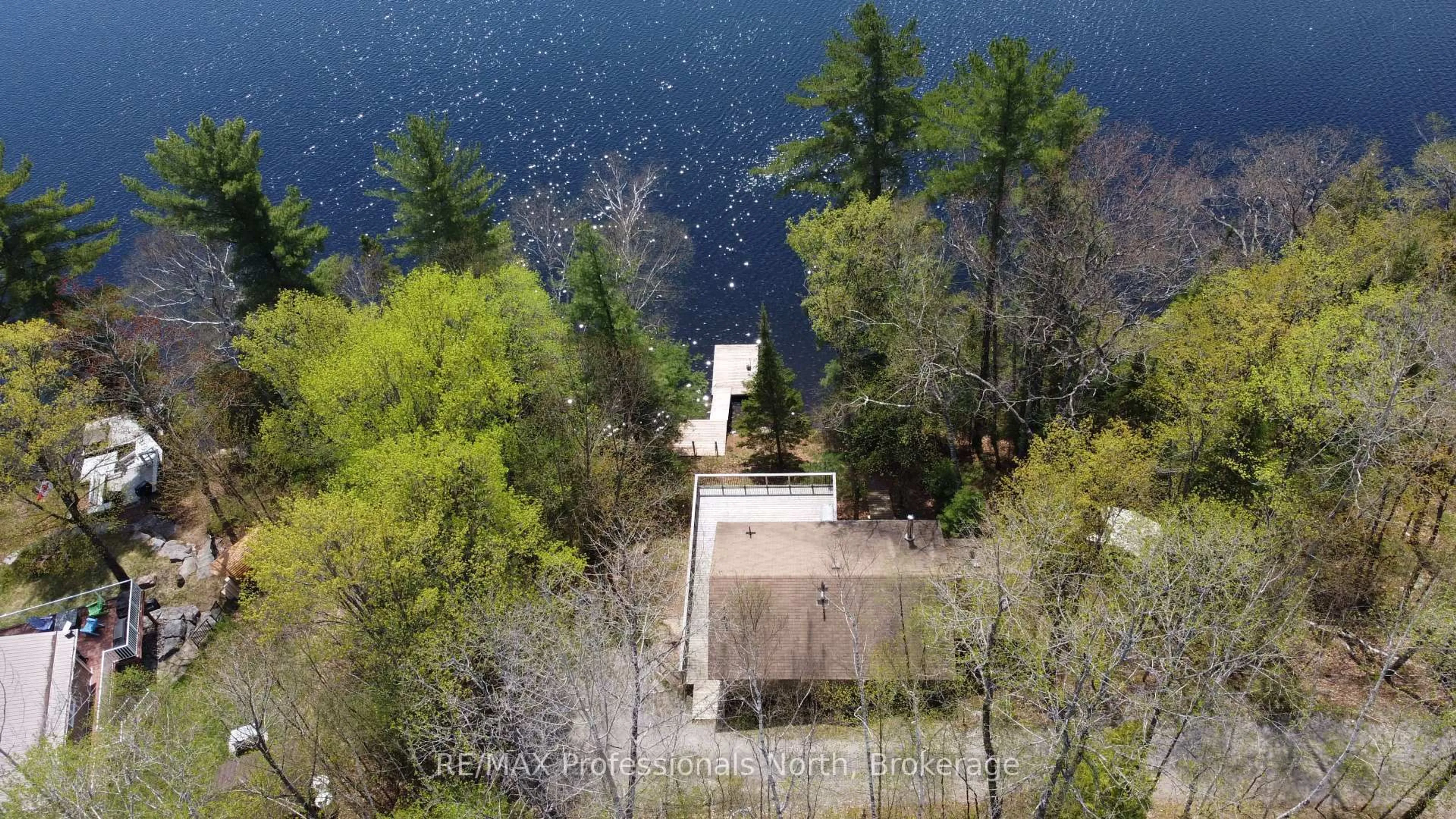 A pic from outside/outdoor area/front of a property/back of a property/a pic from drone, water/lake/river/ocean view for 1196 Portage Rd, Dysart et al Ontario K0M 1S0