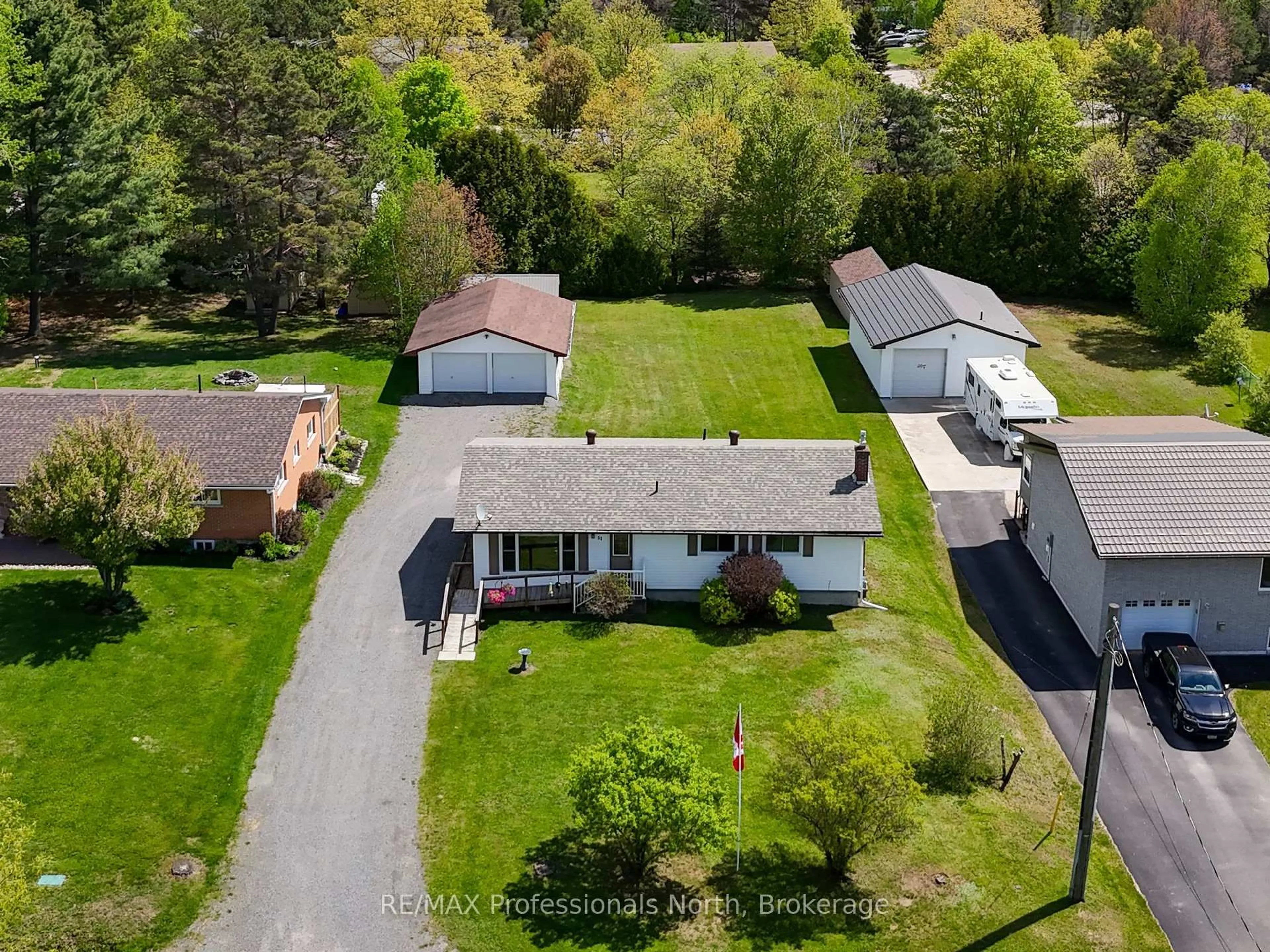 A pic from outside/outdoor area/front of a property/back of a property/a pic from drone, street for 51 John St, Sundridge Ontario P0A 1Z0