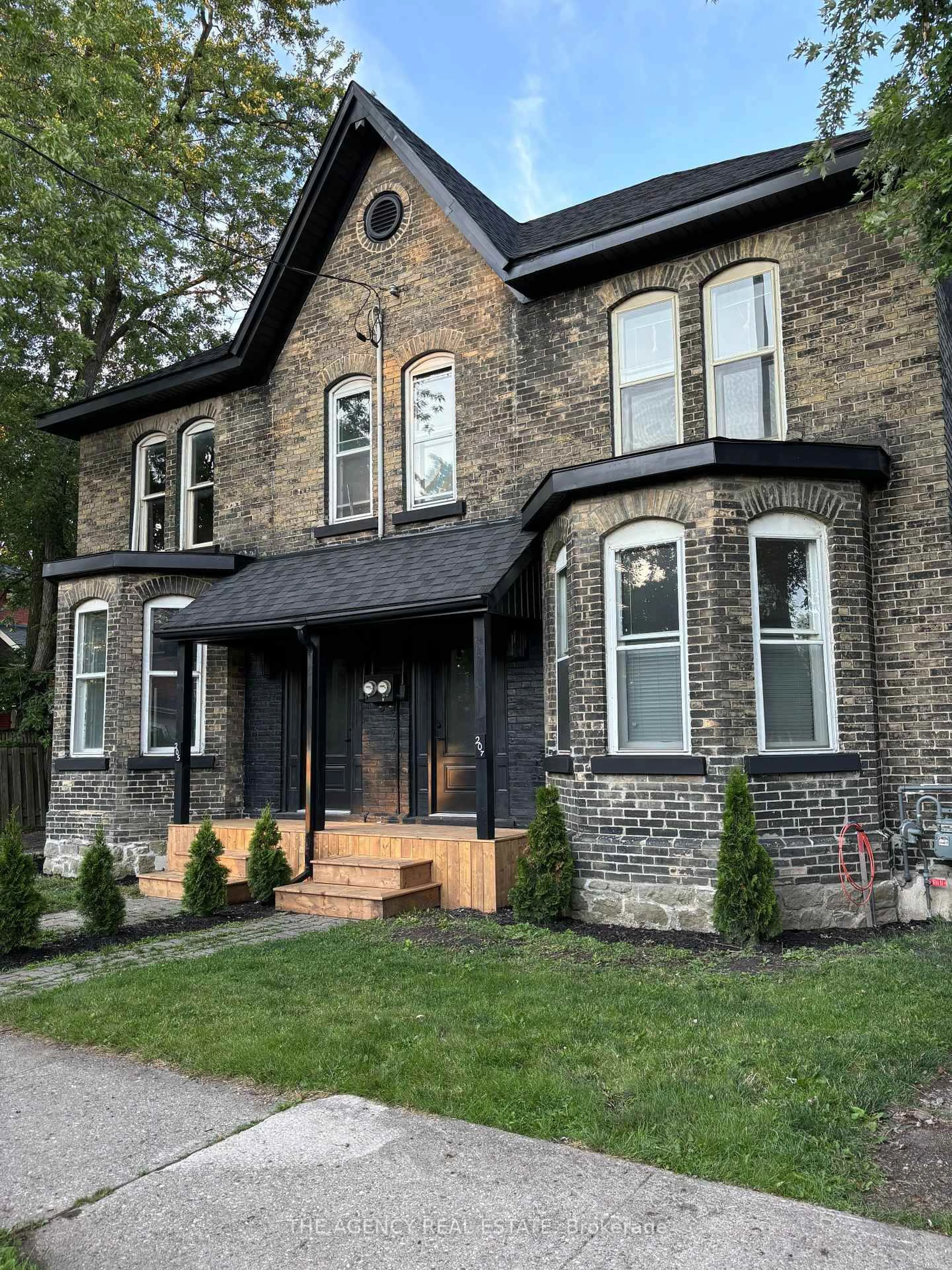 Home with brick exterior material, street for 207 Nile St #205, Stratford Ontario N5A 4E7