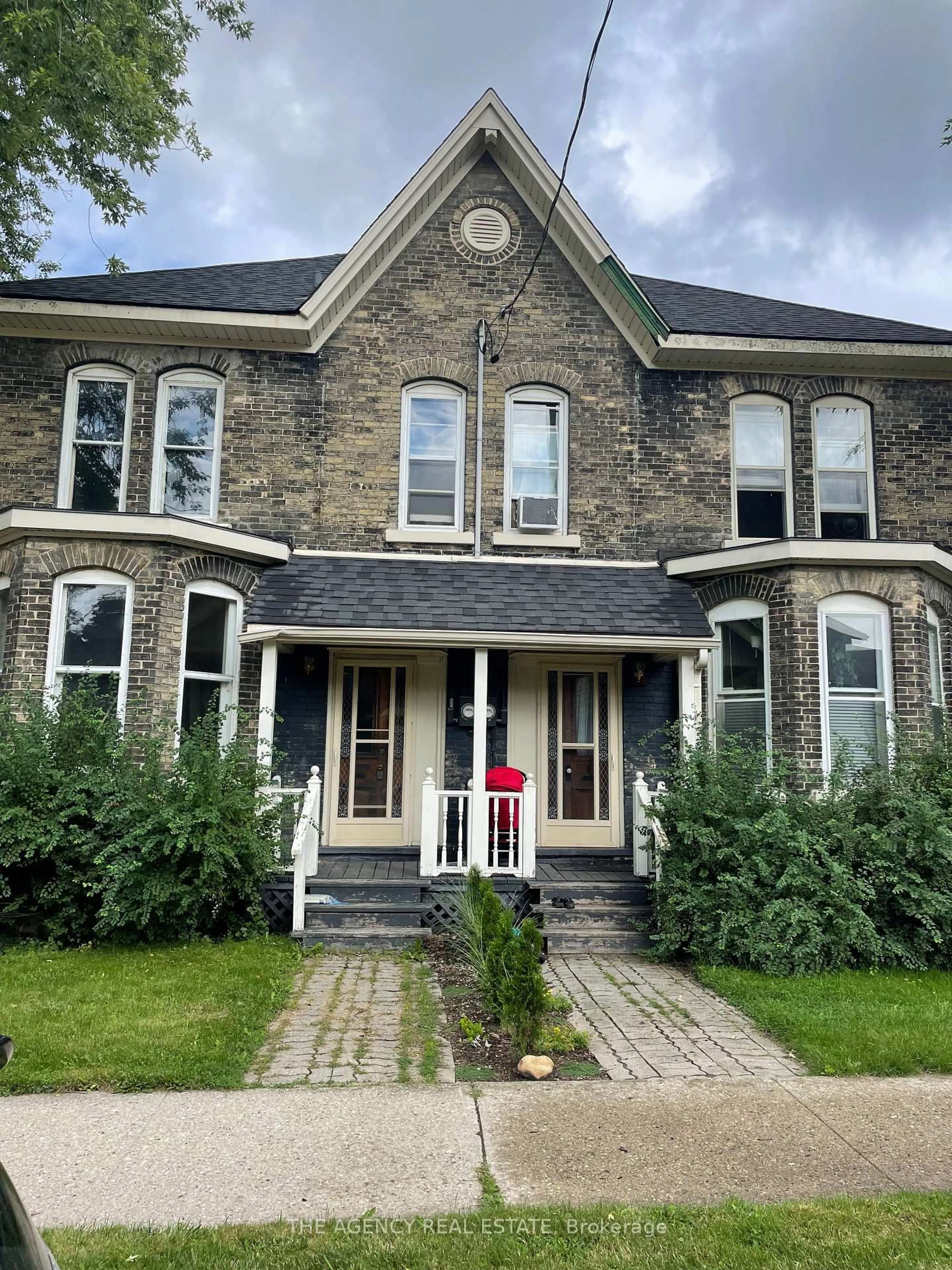 Home with brick exterior material, street for 207 Nile St #205, Stratford Ontario N5A 4E7