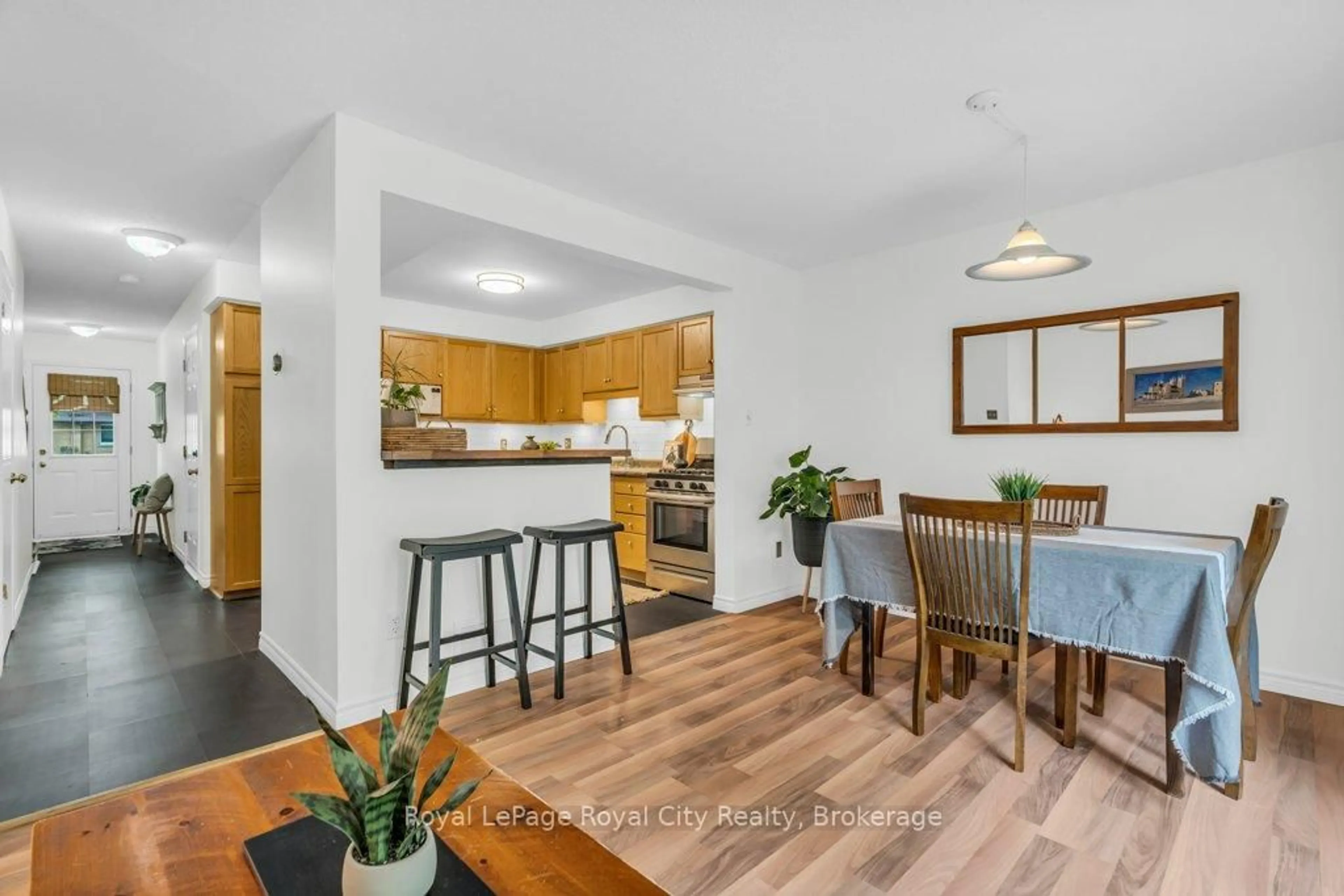 Open concept kitchen, wood/laminate floor for 240 London Rd #61, Guelph Ontario N1H 8N8