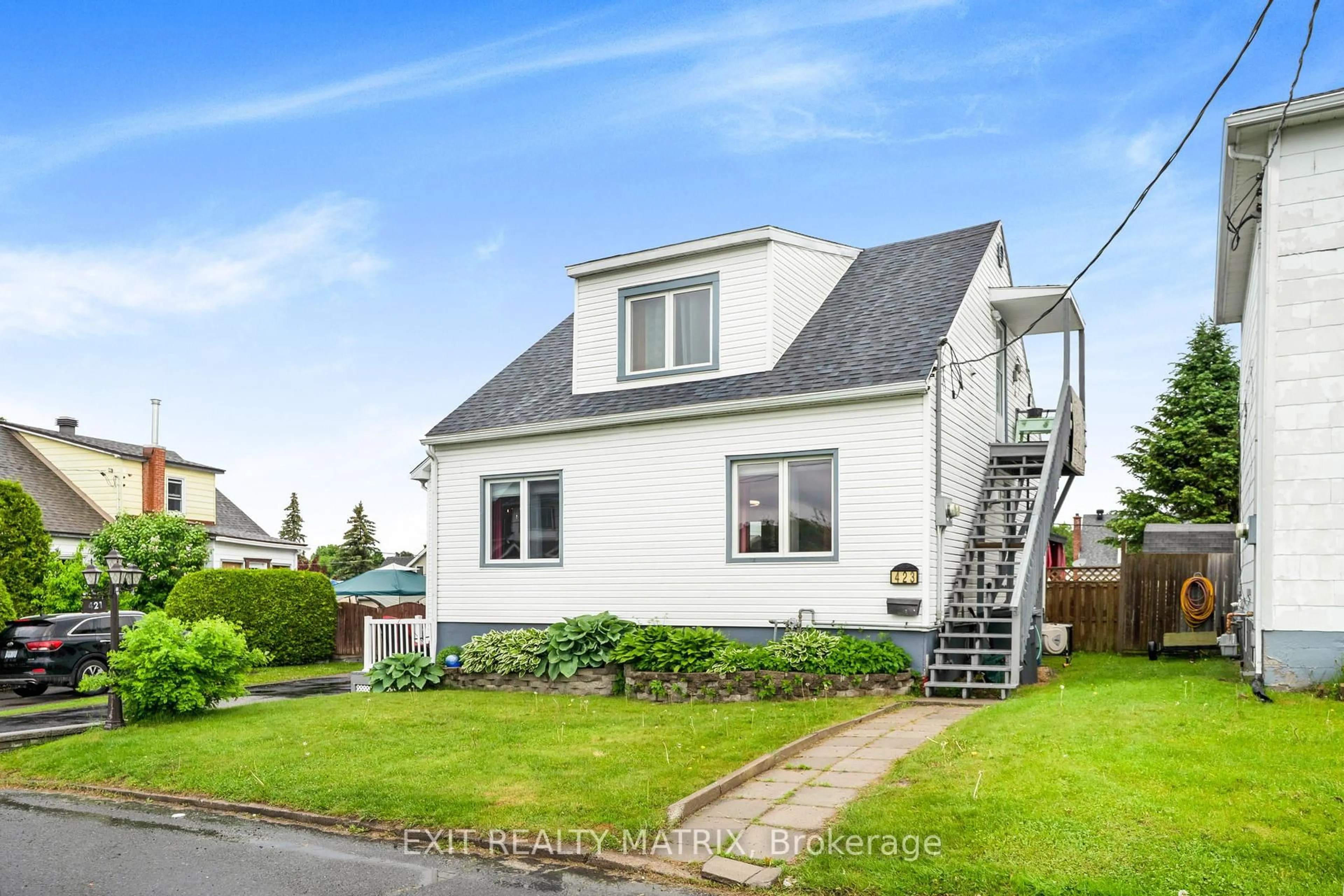 Home with vinyl exterior material, street for 421-423 Garneau Rd, Hawkesbury Ontario K6A 1M6