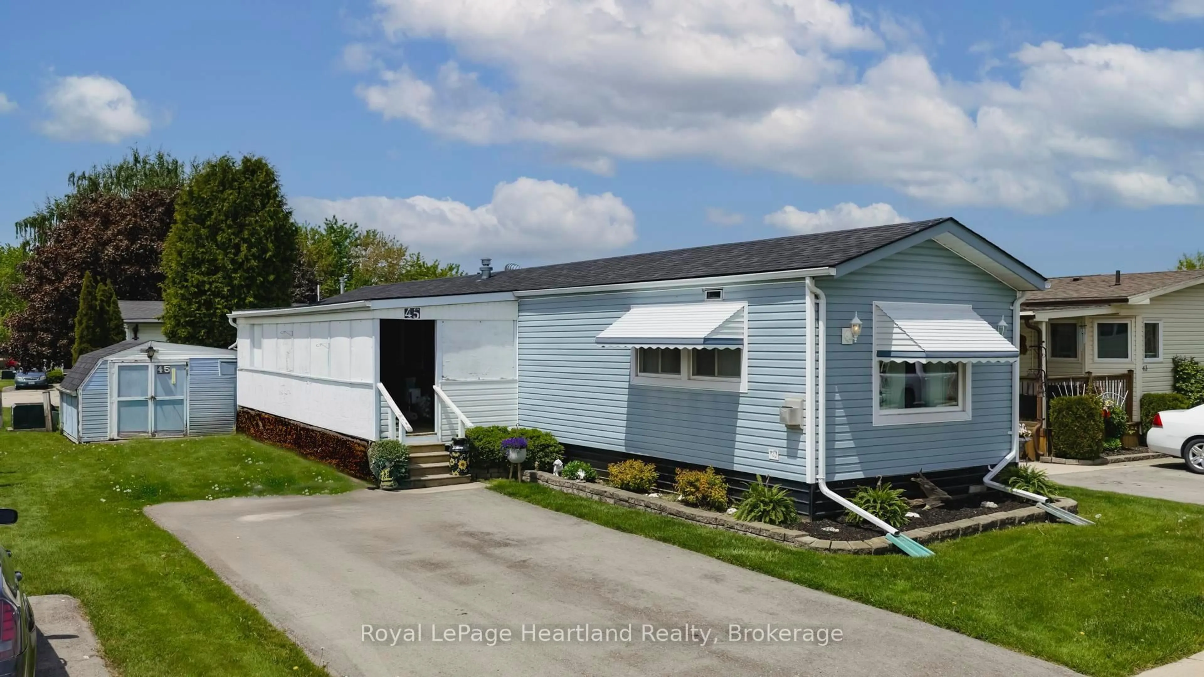 Home with vinyl exterior material, street for 45 REDFORD Dr, South Huron Ontario N0M 1S3