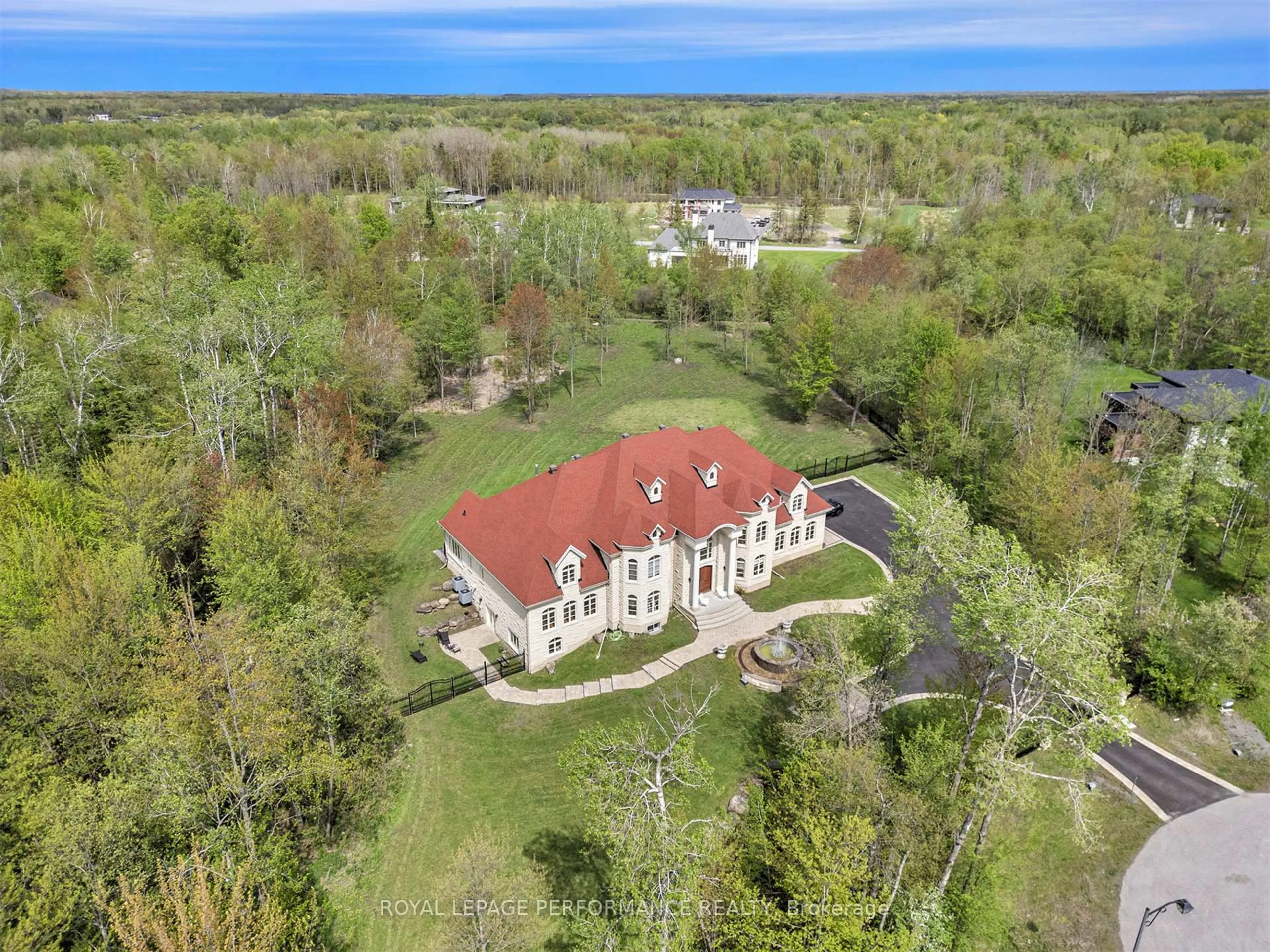 A pic from outside/outdoor area/front of a property/back of a property/a pic from drone, water/lake/river/ocean view for 1413 BLACKHORSE Crt, Manotick Ontario K4M 0A6