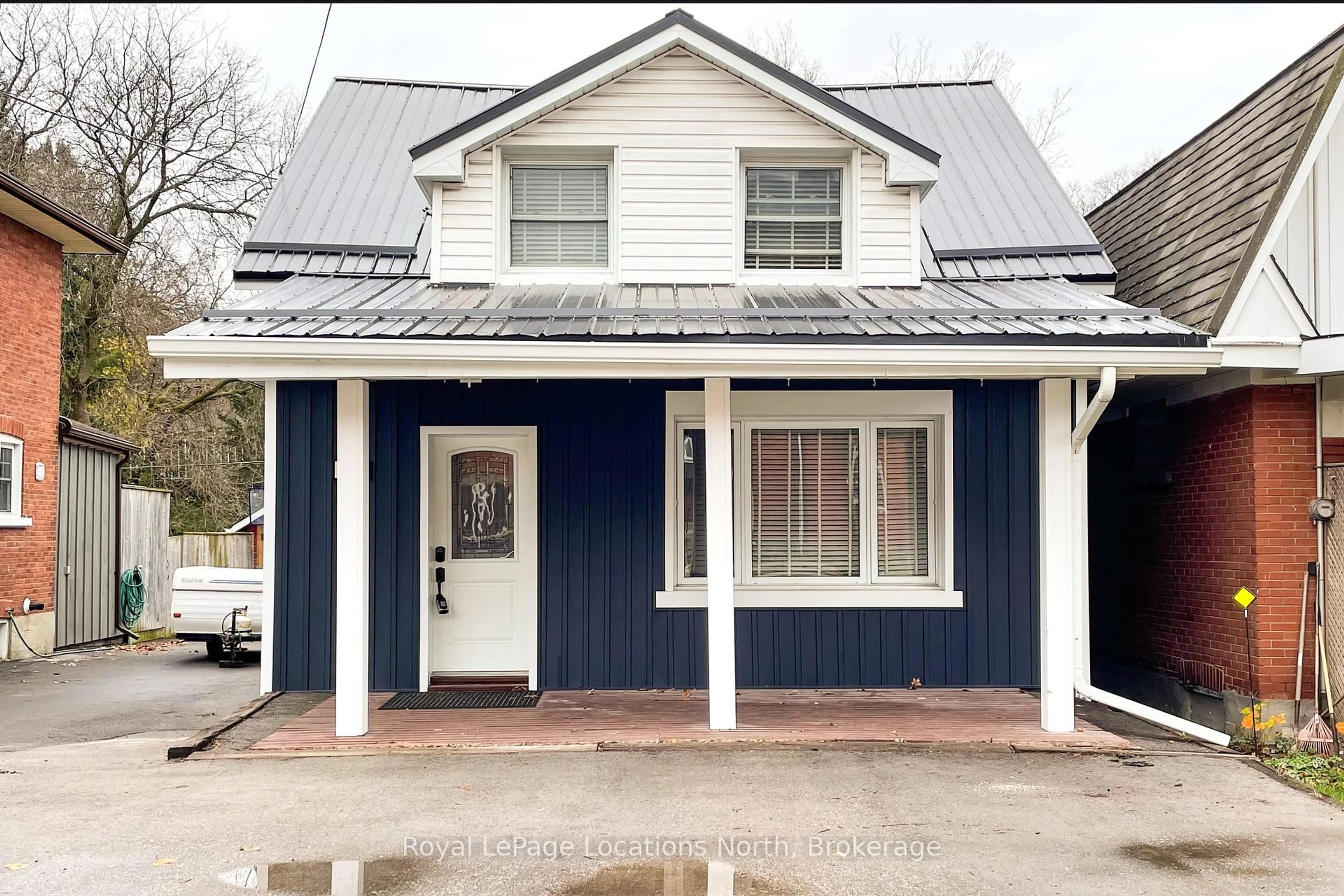 Home with vinyl exterior material, street for 56 Sykes St, Meaford Ontario N4L 1E3
