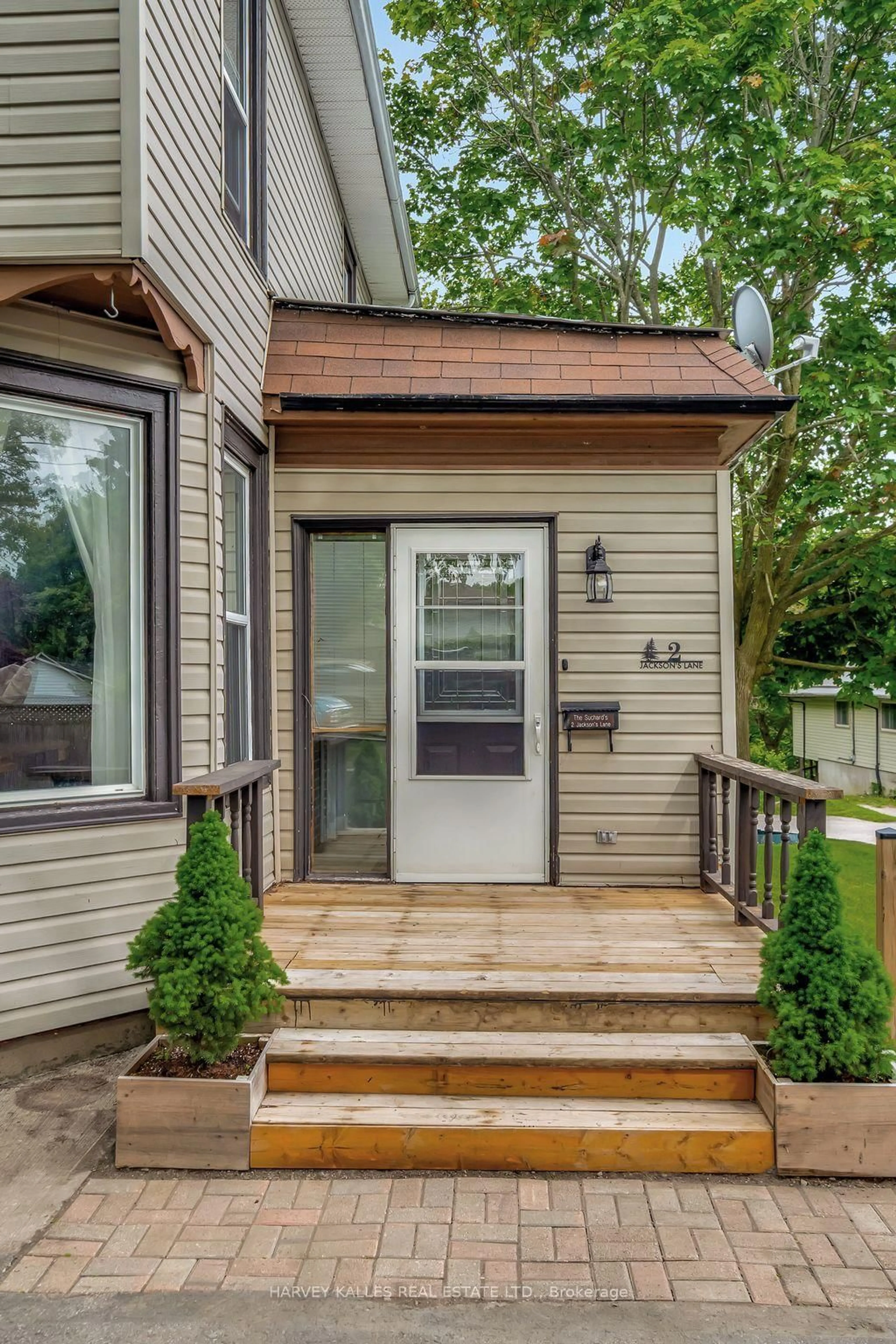 Home with vinyl exterior material, street for 2 Jacksons Lane, Prince Edward County Ontario K0K 2T0